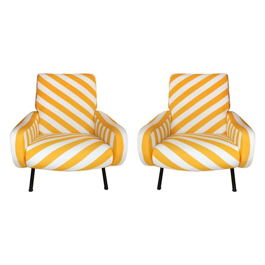 Pair of armchairs design by Marco Zanuso and edited by Arflex. Made of solid wood structure, reupholstered in yellow and white pattern cotton fabric. Black lacquered metal cylindrical shape legs, Italy, 1960s. 

Our main target is customer