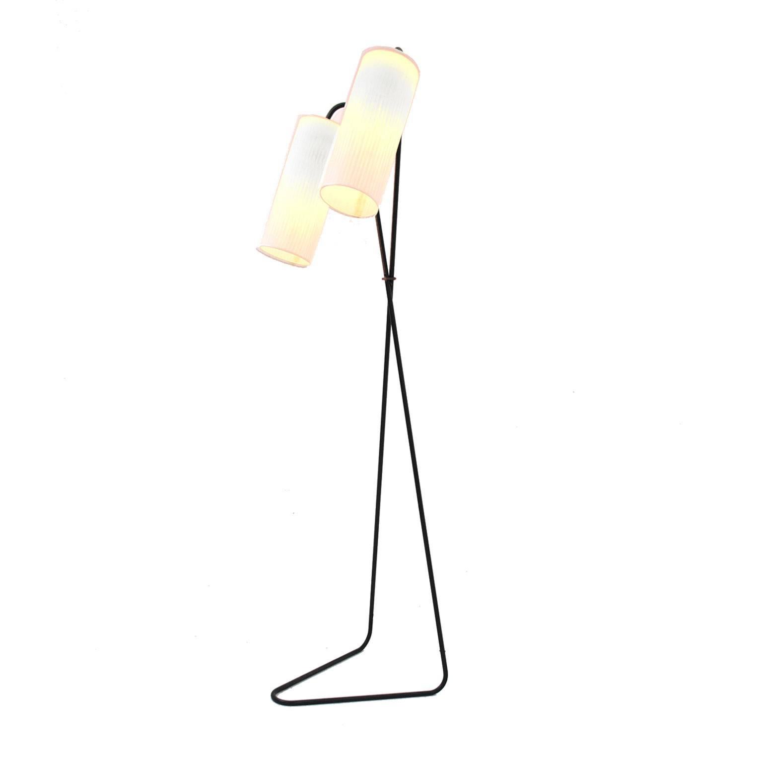 Floor lamp with black lacquer metal structure composed by two point lights with  vegetable fibre.