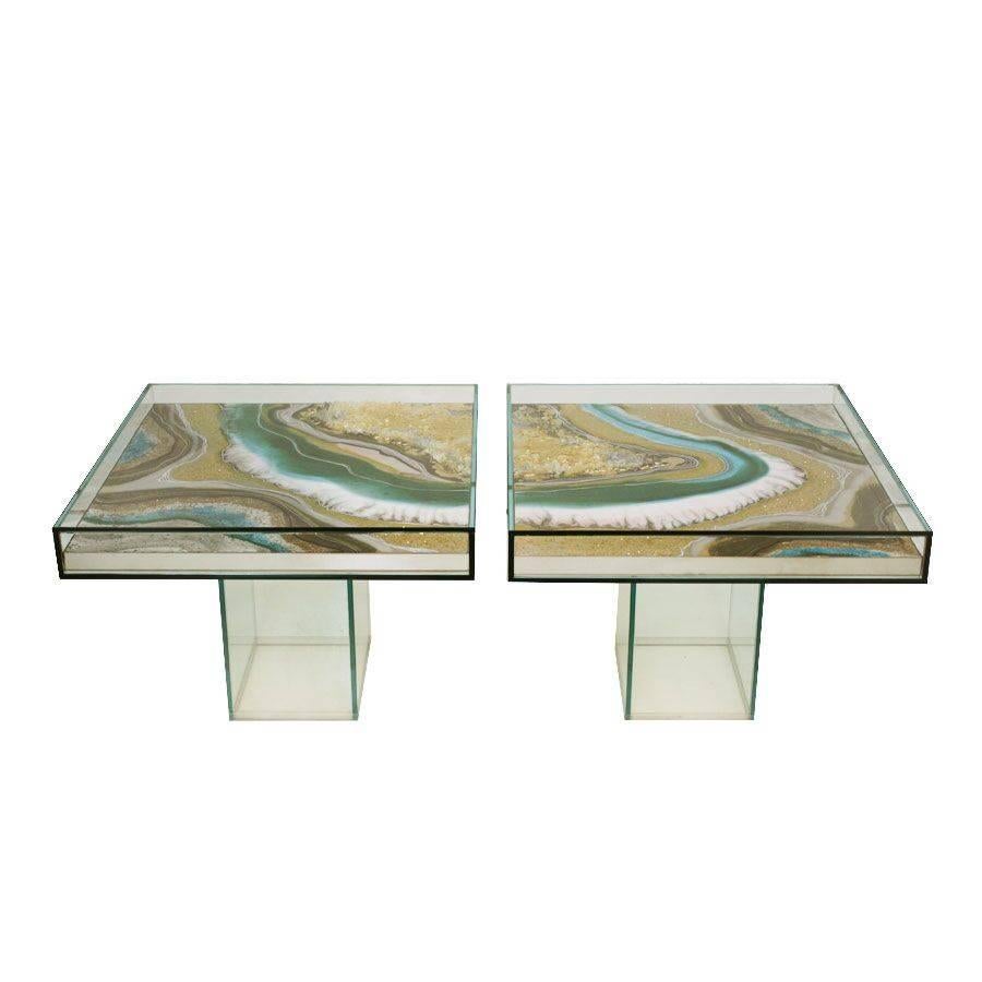 Pair of side tables designed by L.A. Studio made with different resins and pigments with crystal structure.