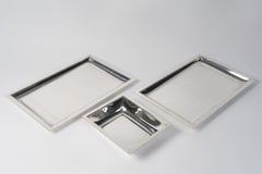 JEAN E. PUIFORCAT – Set of two rectangular platters and a bowl in solid silver