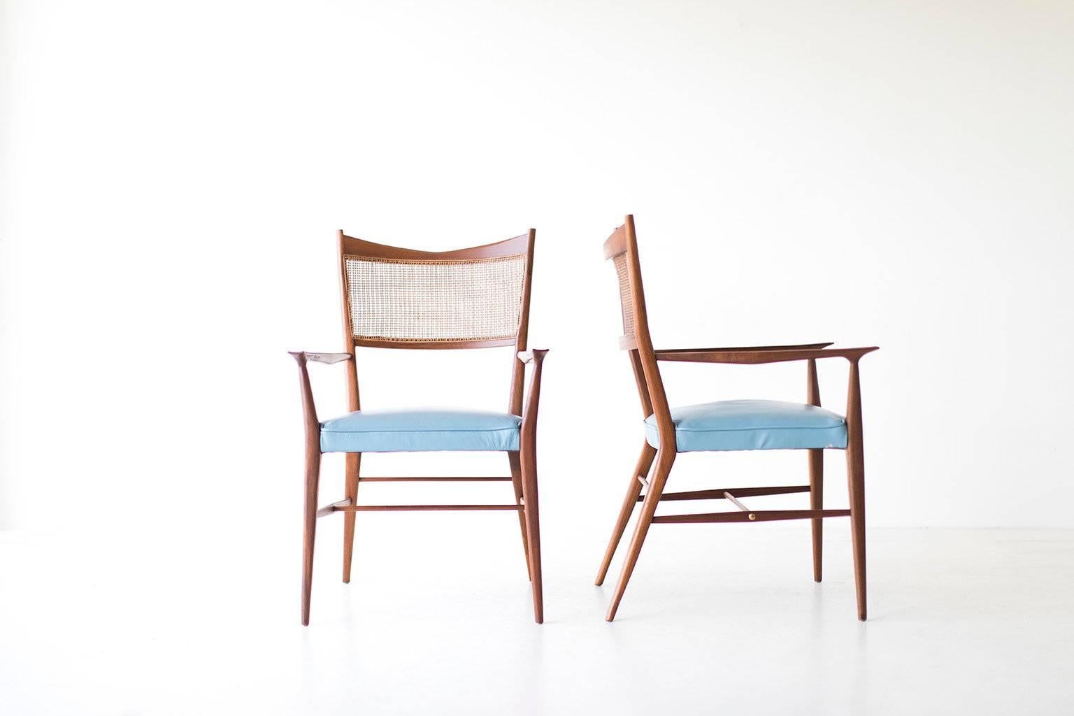 Designer: Paul McCobb. 

Manufacturer: H Sacks & Sons, Connoisseur Collection. 
Period or model: Mid-Century Modern. 
Specs: Walnut, Cane, Brass, Leather. 

Condition: 

These Paul McCobb dining chairs for H Sacks & Sons, Connoisseur