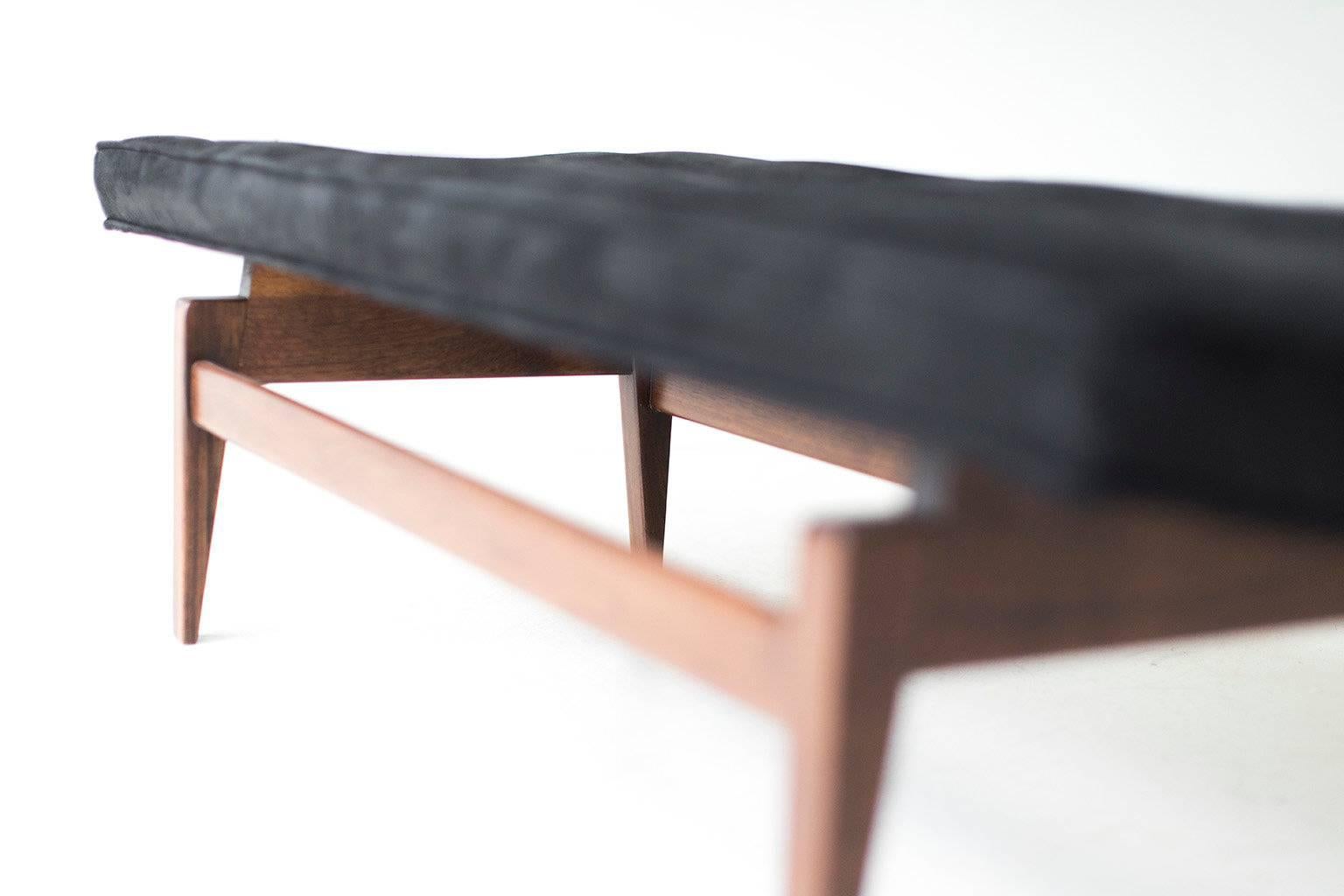 Designer: Jens Risom. 

Manufacturer: Jens Risom Design Inc. 
Period or model: Mid-Century Modern.
Specifications: Walnut, leather. 

Condition: 

This Jens Risom bench for Risom Deign Inc. is in excellent restored condition. The walnut
