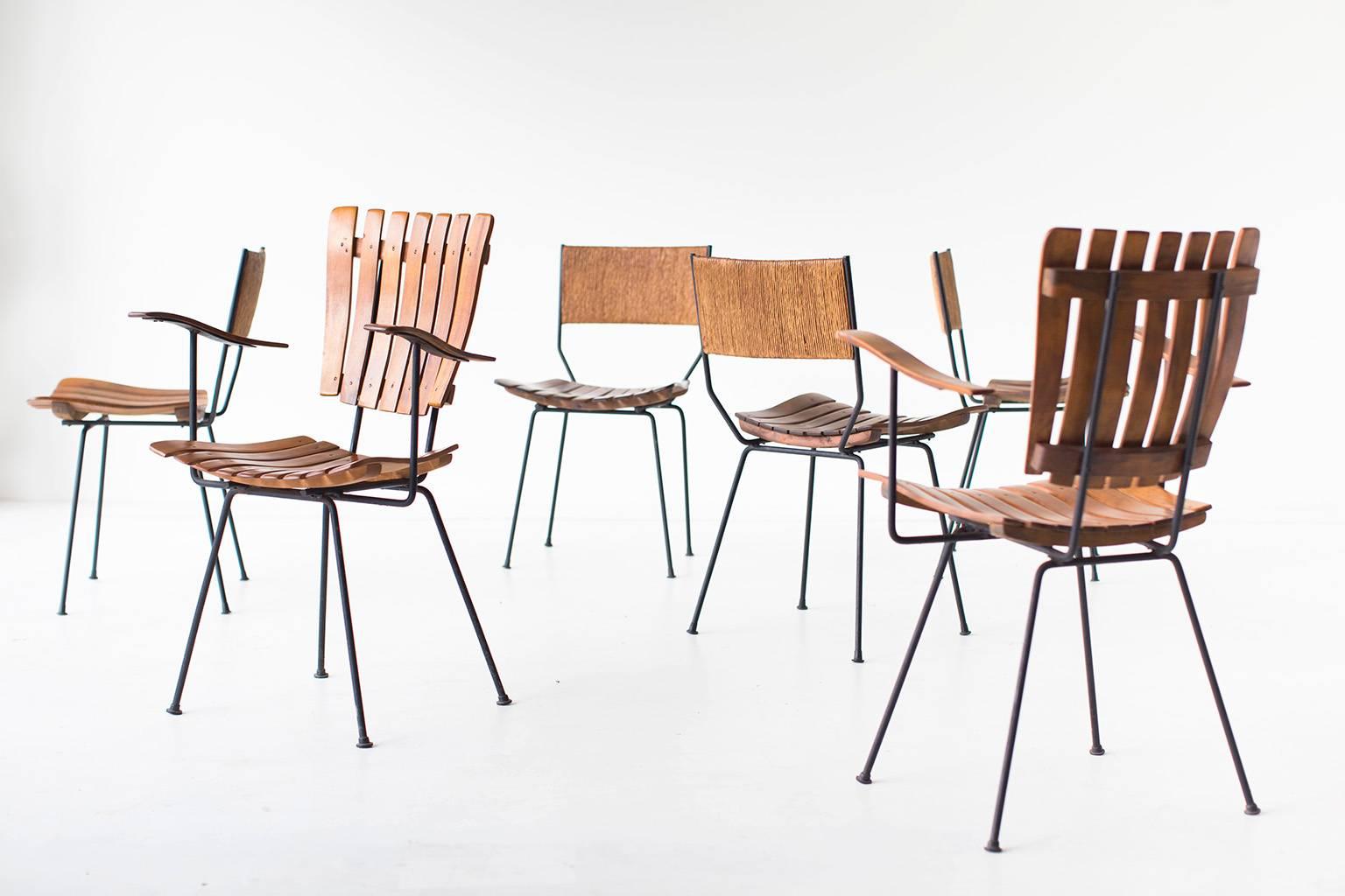 Designer: Arthur Umanoff.

Manufacturer: Raymor.
Period and model: Mid-Century Modern.
Specifications: Wood, iron.

Condition:

**The Armchairs have sold from this set.** Price has been adjusted.
This Arthur Umanoff dining set for Raymor is in very