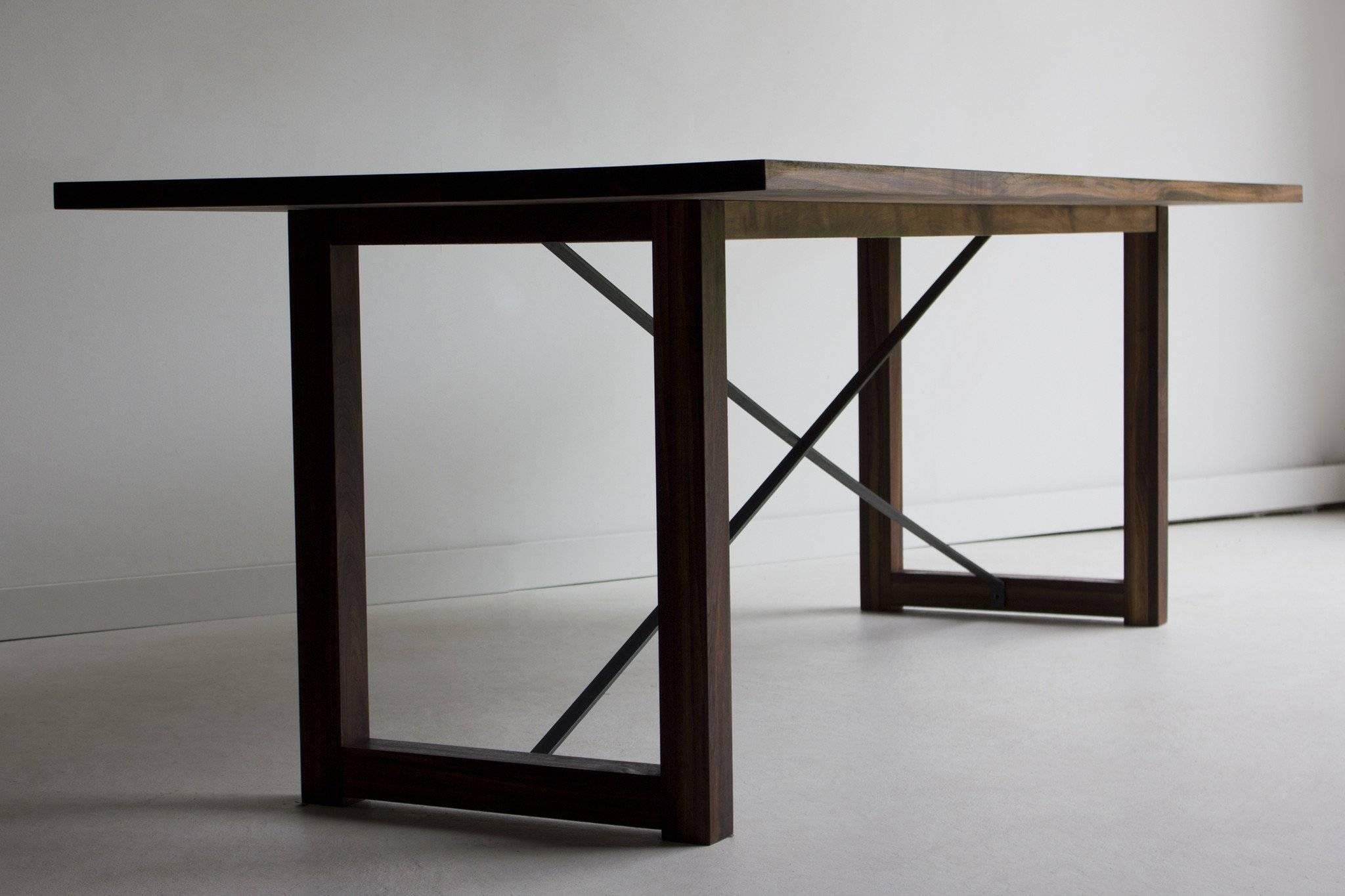 Modern wood dining table - 0116

This modern wood dining table is made in the heart of Ohio with locally sourced wood. We use the table both as a harvest dining table or desk. Each table is handmade with solid black walnut and finished with a