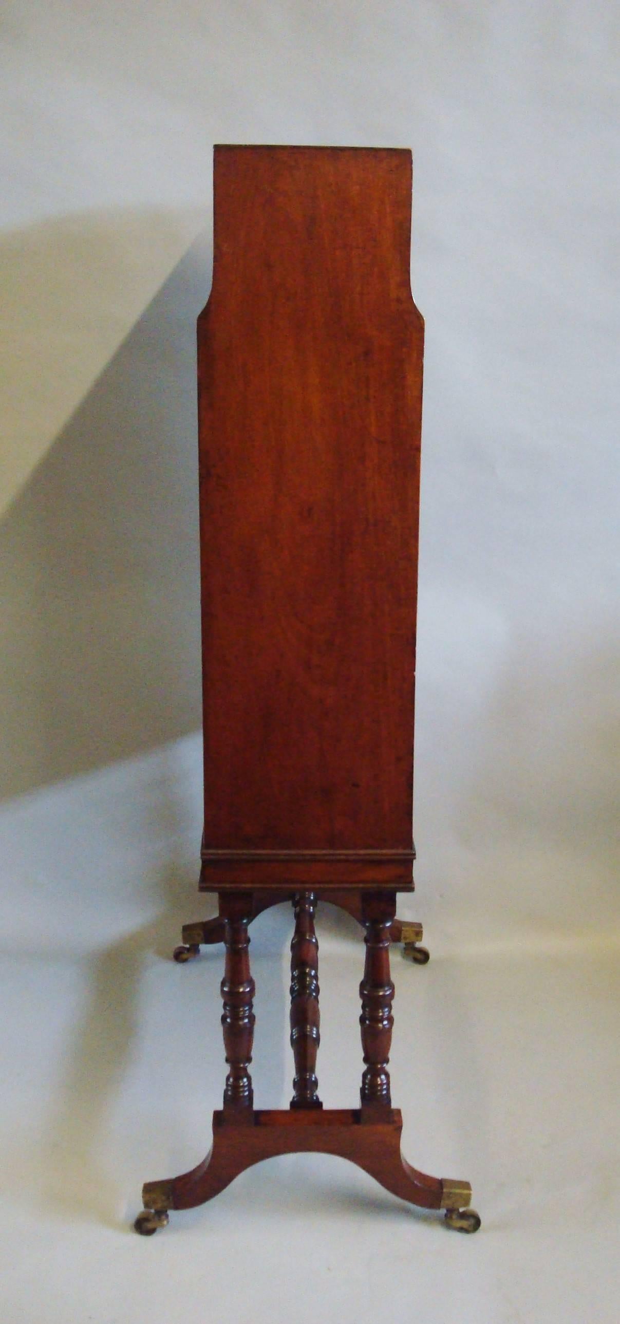 Early 19th Century Regency Mahogany Waterfall Open Bookcase of Freestanding Form For Sale