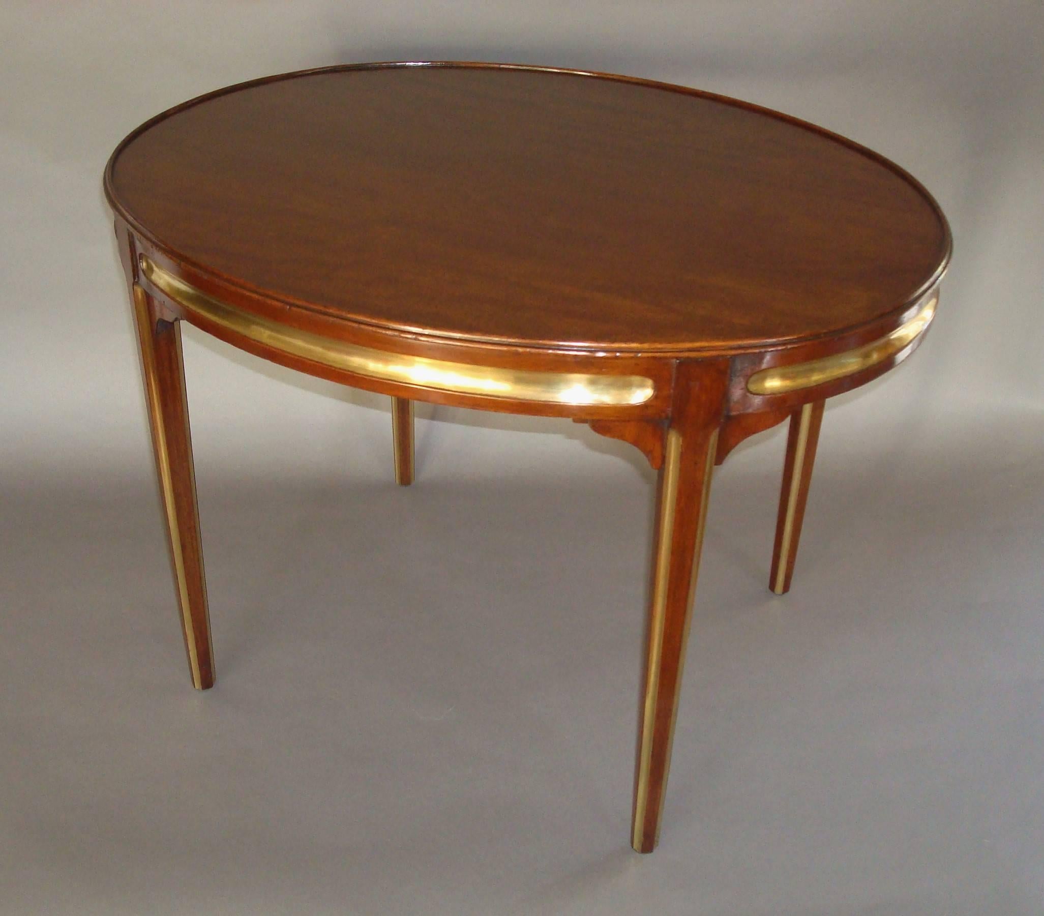 French Early 20th Century Oval Mahogany and Brass Low Table For Sale