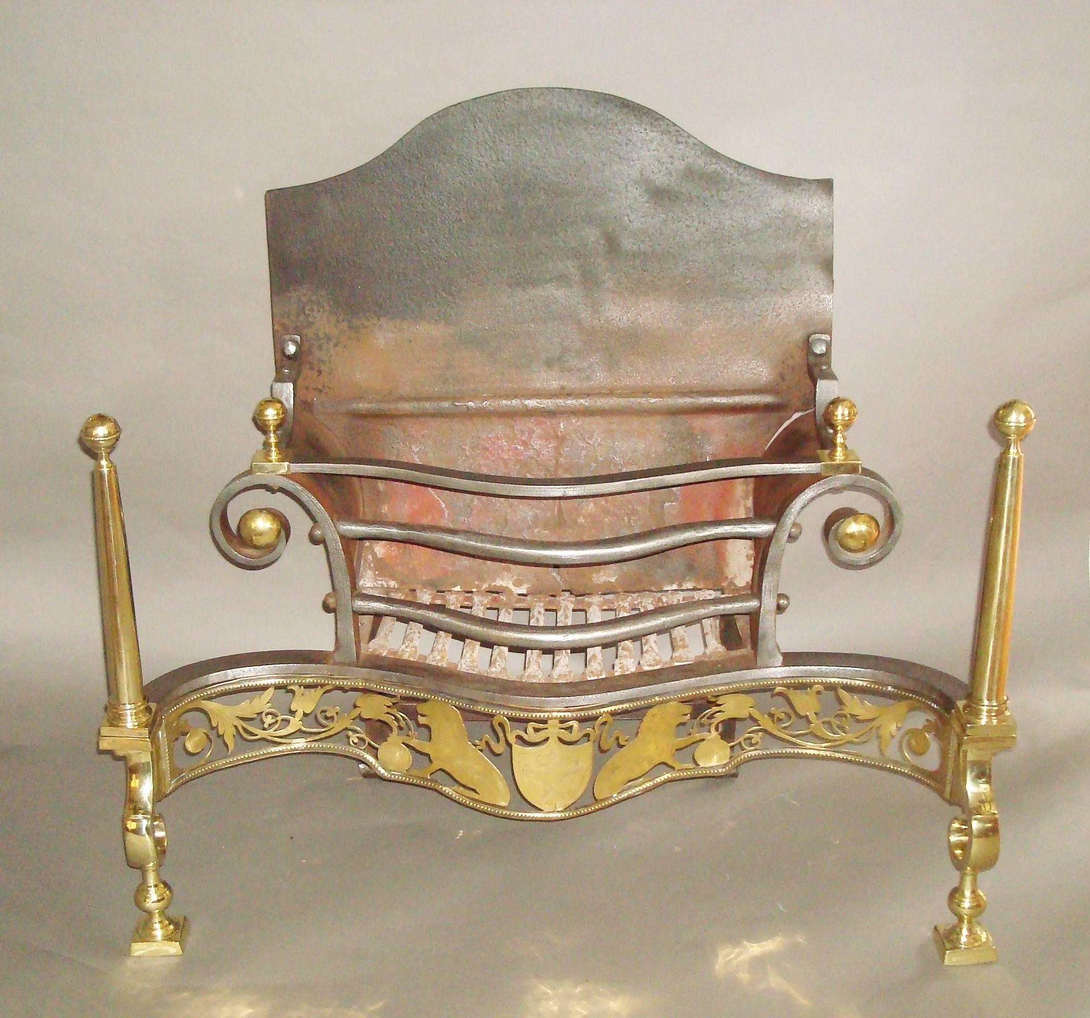 An exceptional 19th century large fire grate of neoclassical design in polished brass and burnished iron; the iron fireback having a serpentine shaped top with shaped sides to the basket. The front with serpentine bars, the top bar with scrolled
