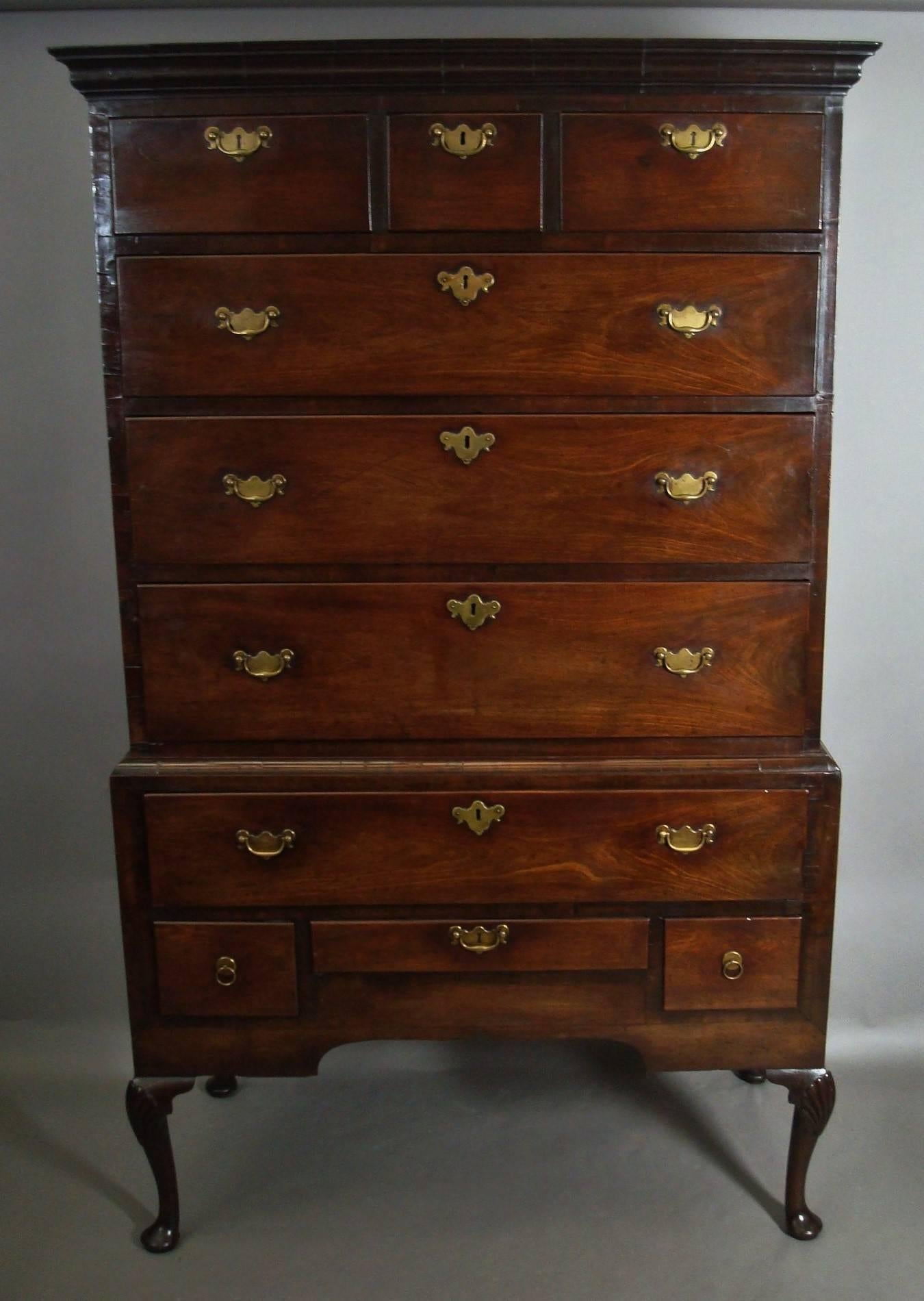 Good George II Irish mahogany chest on stand; the crossgrain moulded cornice above three short and three long drawers, raised on a stand with a crossgrain waist mould and incorporating one long drawer with a small shallow drawer below flanked by a