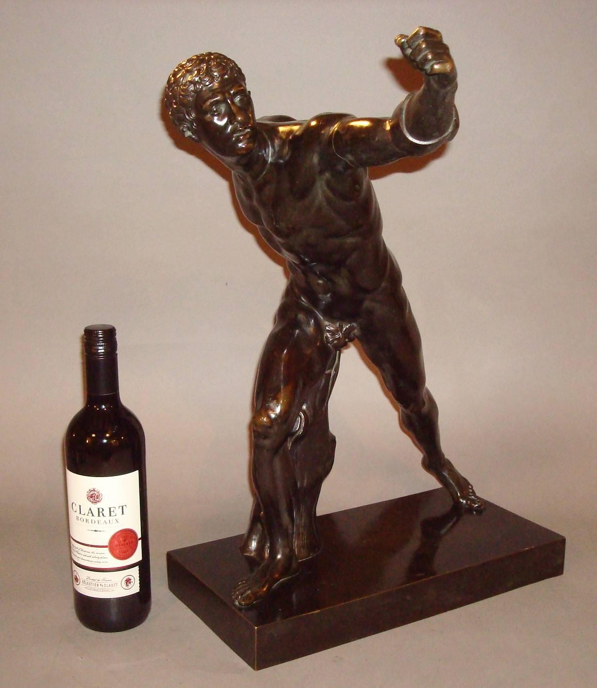 19th century Grand Tour, classical bronze figure of the Borghese Gladiator of large proportions. Standing on a bronze rectangular plinth. The good dark patination emphasizes his well sculpted muscles; and Fine quality chase work to his face and