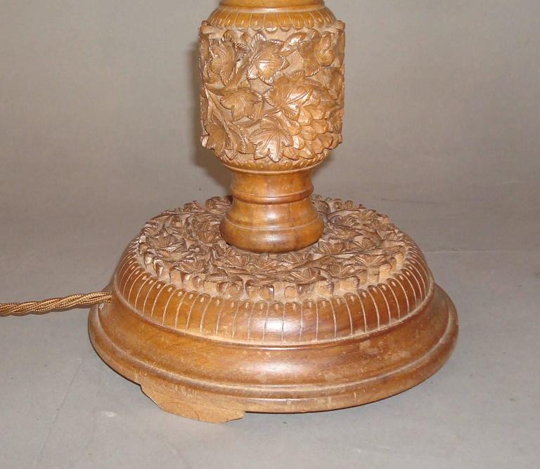 Early 20th Century Pair of Indian Carved Walnut Table Lamps For Sale at