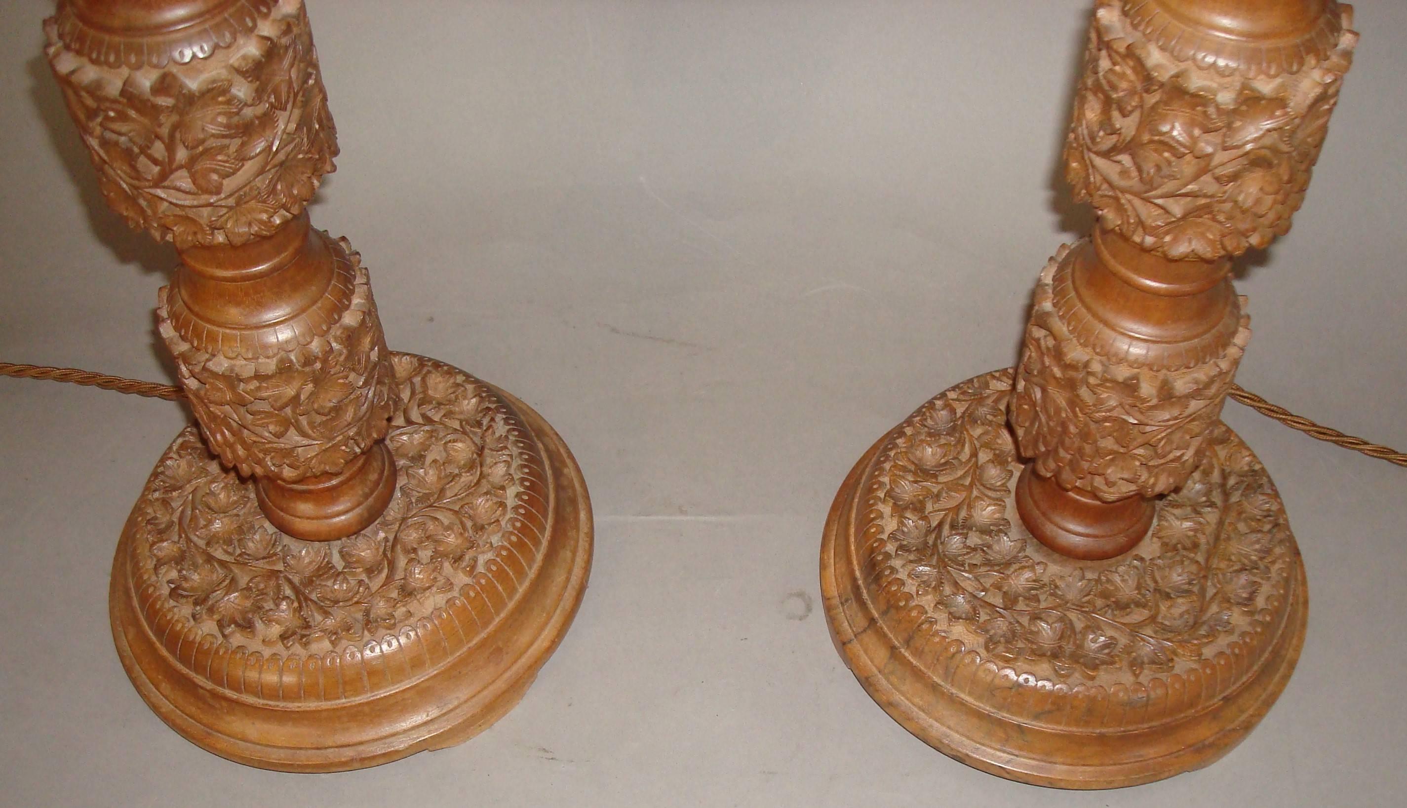 Anglo-Indian Early 20th Century Pair of Indian Carved Walnut Table Lamps For Sale