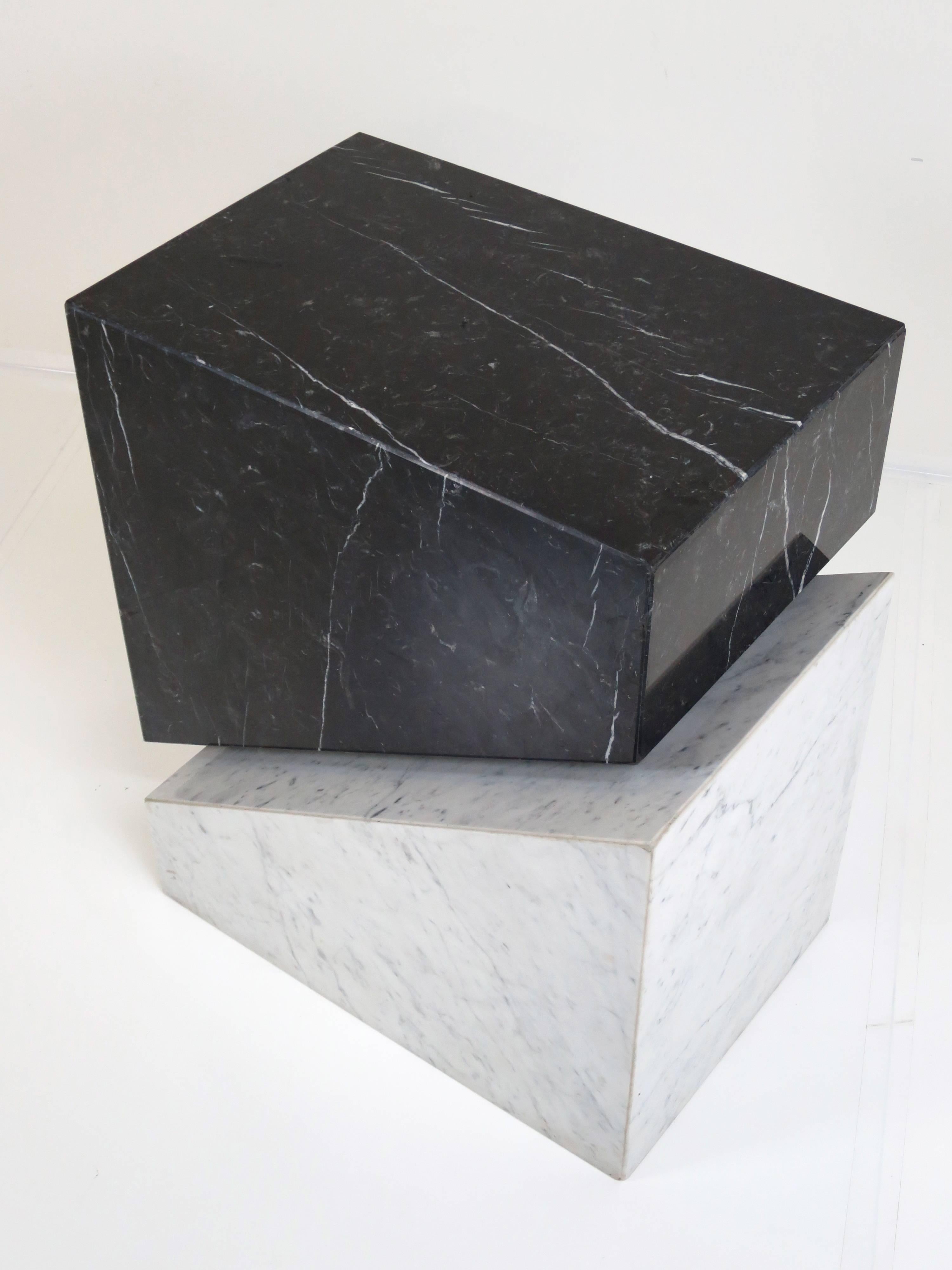 Incredibly heavy Italian marble table or table base. This piece is sculptural enough to be used as a large side table, utilitarian enough to function as a pedestal, and substantial enough to work as a dining table base. Contrasting black and white