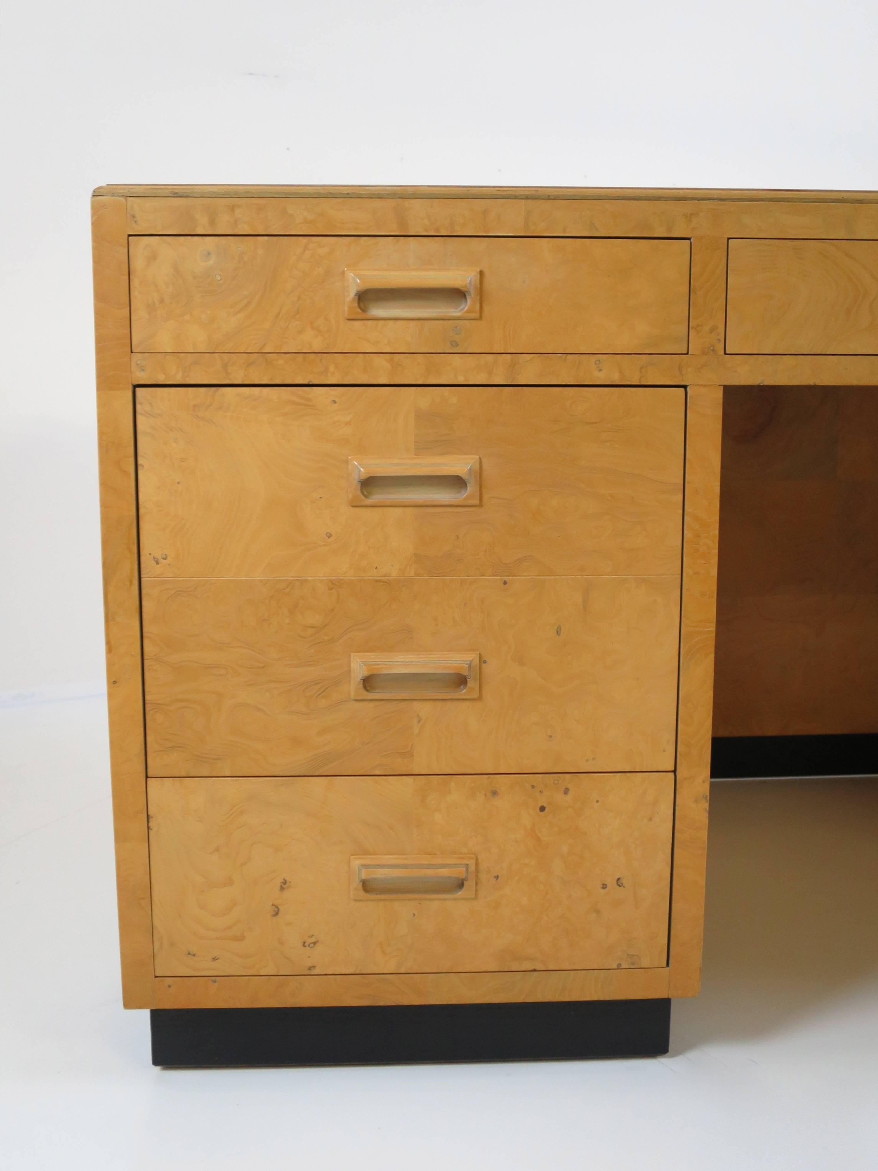 Scene two executive desk by Henredon. Features two large filing drawers with locking mechanism, locking center drawer and three pull-out work surfaces. This desk is made with the highest quality construction that you can ask for, sheer weight is