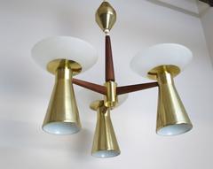 Modernist Perforated Brass and Walnut Chandelier, circa 1960s