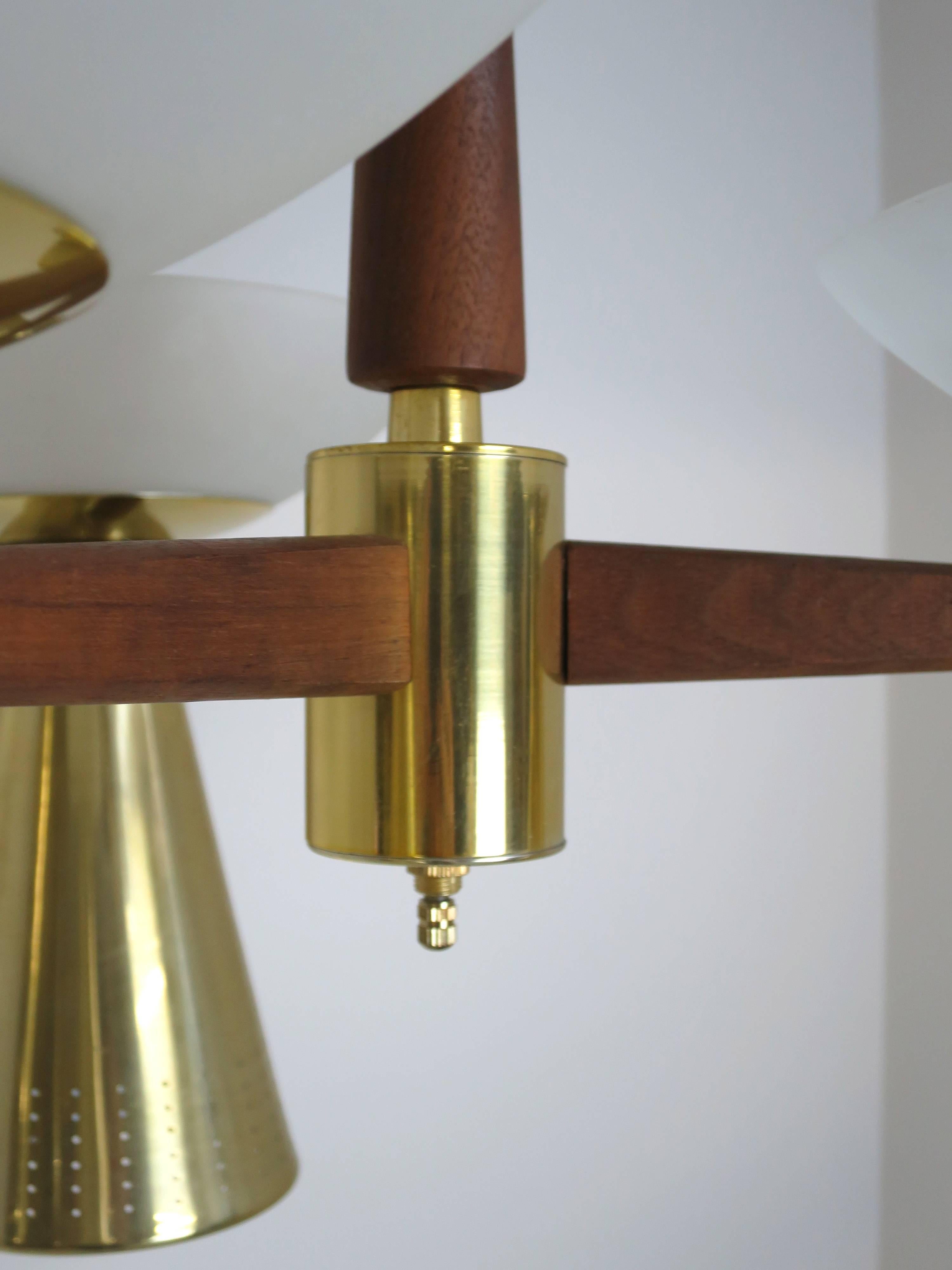 Mid-20th Century Modernist Perforated Brass and Walnut Chandelier, circa 1960s For Sale