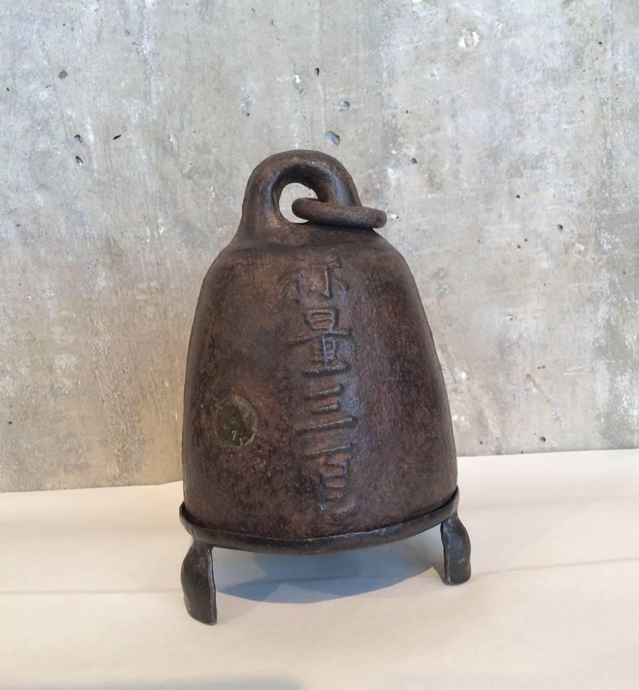 A very unusual dome shaped cast iron weight from Shanxi Province with distinct Chinese characters on both sides.   Antique cast iron weights from China of this age and condition are very rarely found in this shape.  The clear Chinese  characters