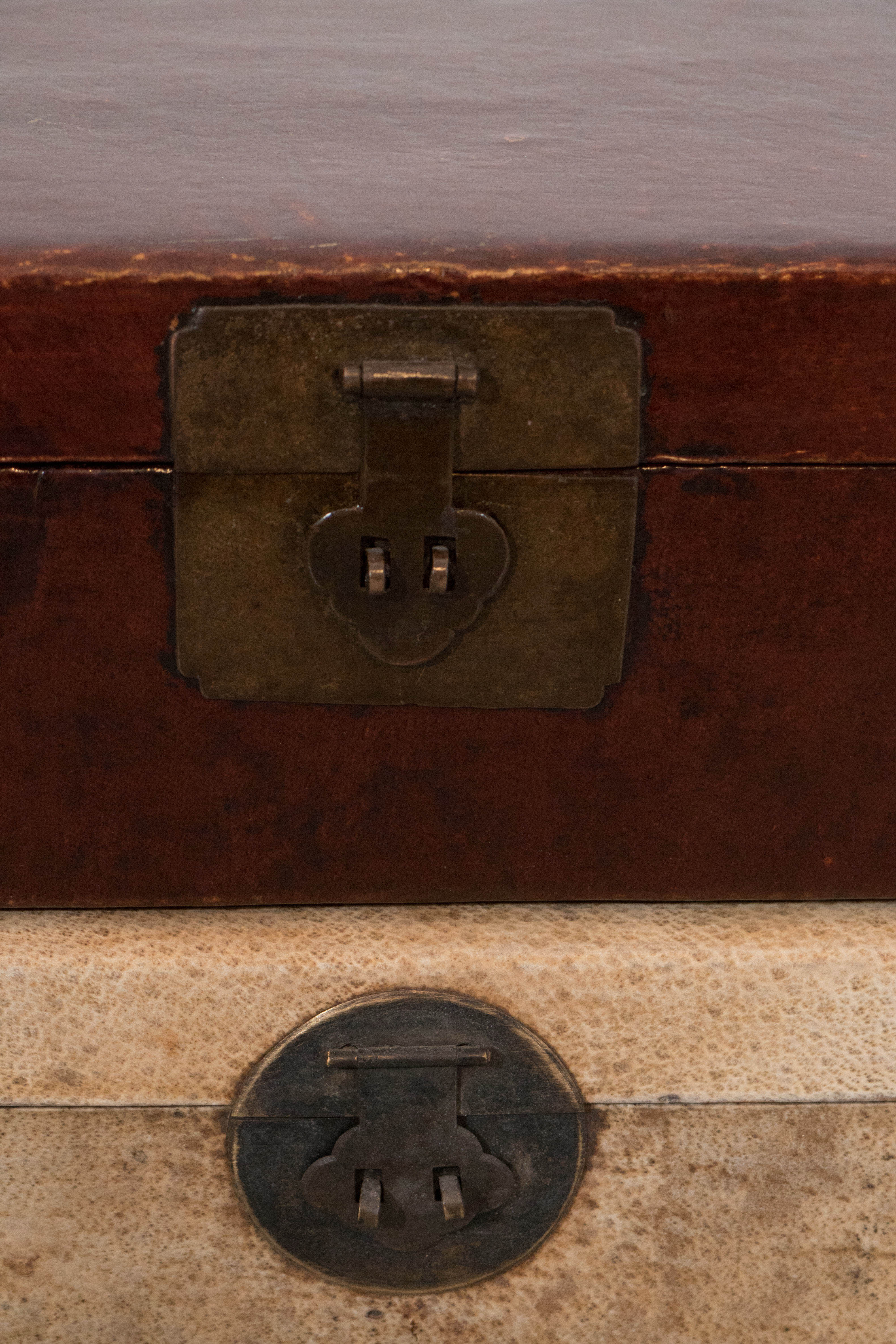 Two antique Chinese parchment leather document boxes from Shanxi Province. Sold individually.
**Light color box SOLD