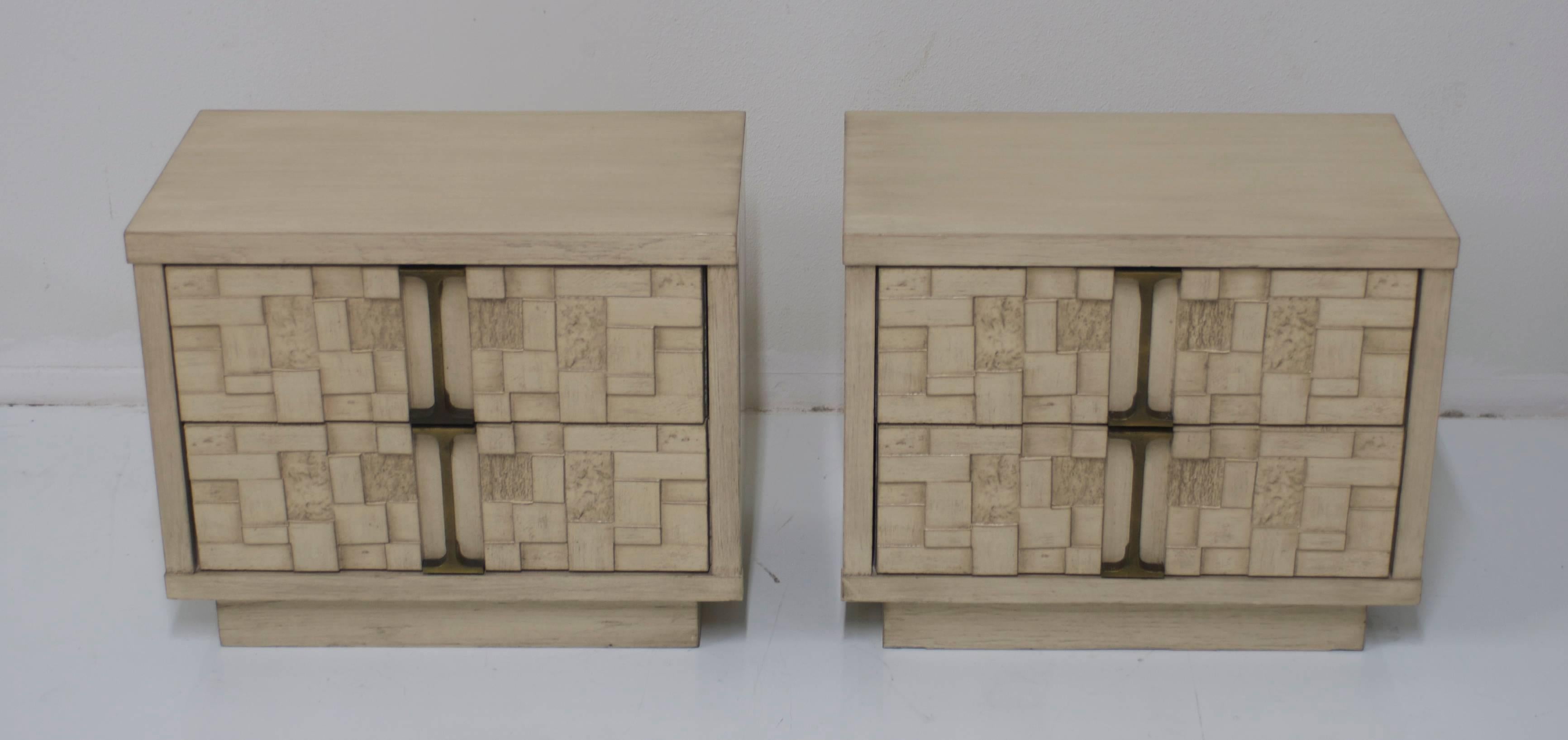 These Brutalist bedside tables which are much in the style of the Lane Mosaic series were manufactured by Burlington House Furniture in the 1970s. They have been refinished in our signature 'driftwood' finish which is a multilayered process which