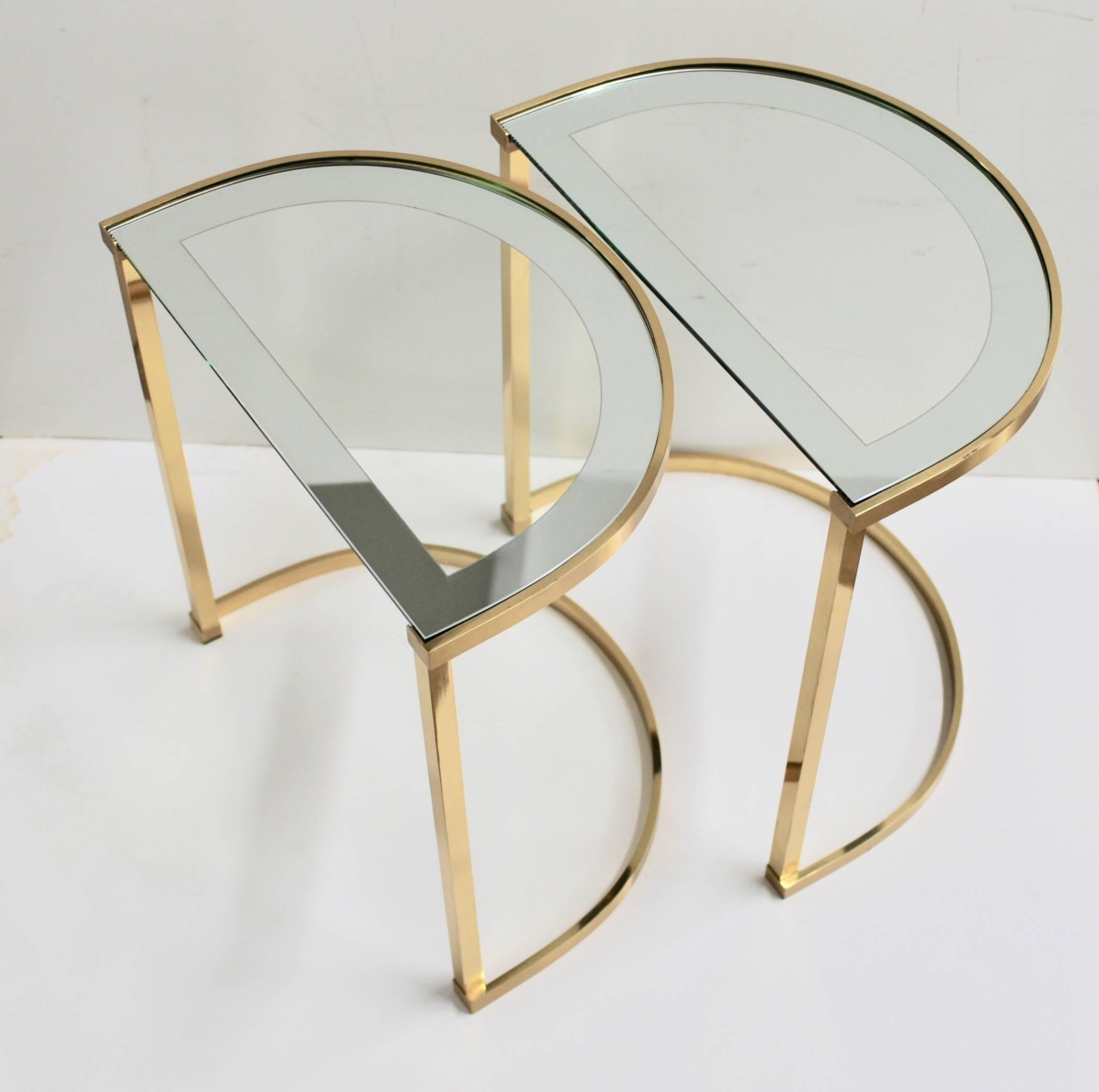 A pair of Italian demilune side tables, circa 1970s with the original glass tops which have a mirror border.