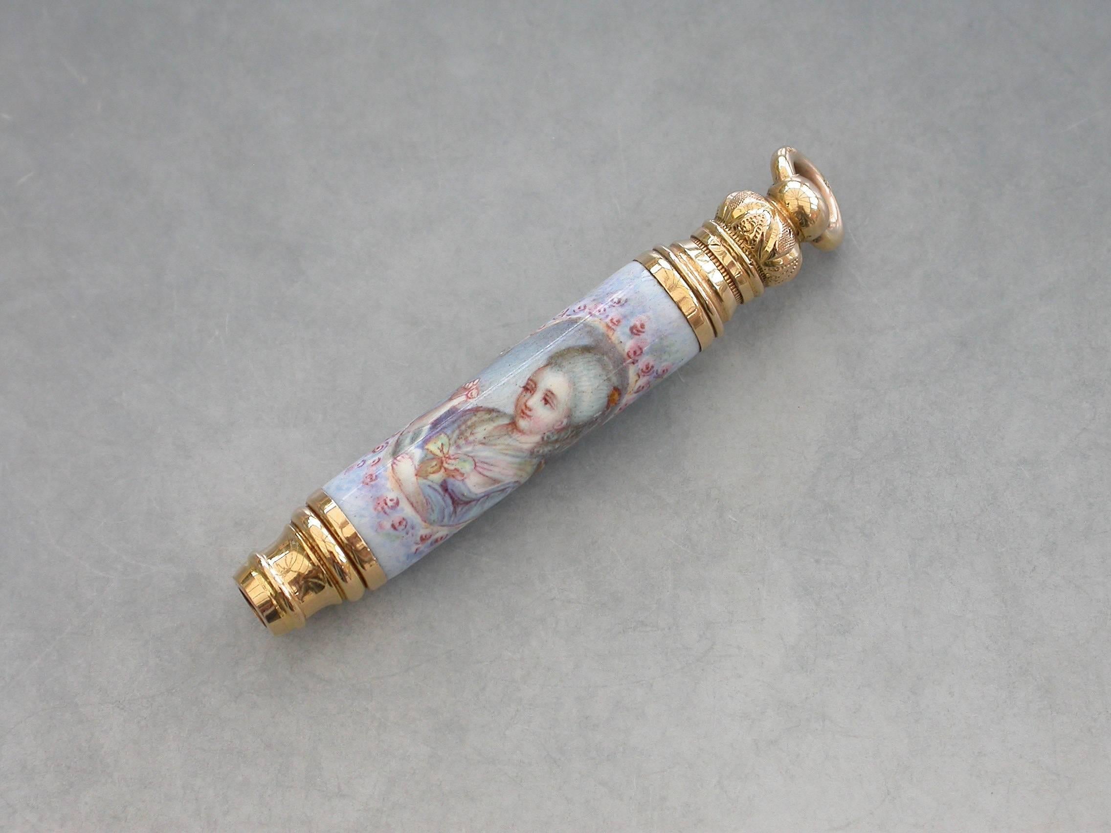 A fine quality late 19th century French high carat gold and enamel telescopic Propelling Pencil decorated with a portrait of a lady in an oval reserve surrounded by flowers on a pale blue ground.

French circa 1880. Marked on the attached