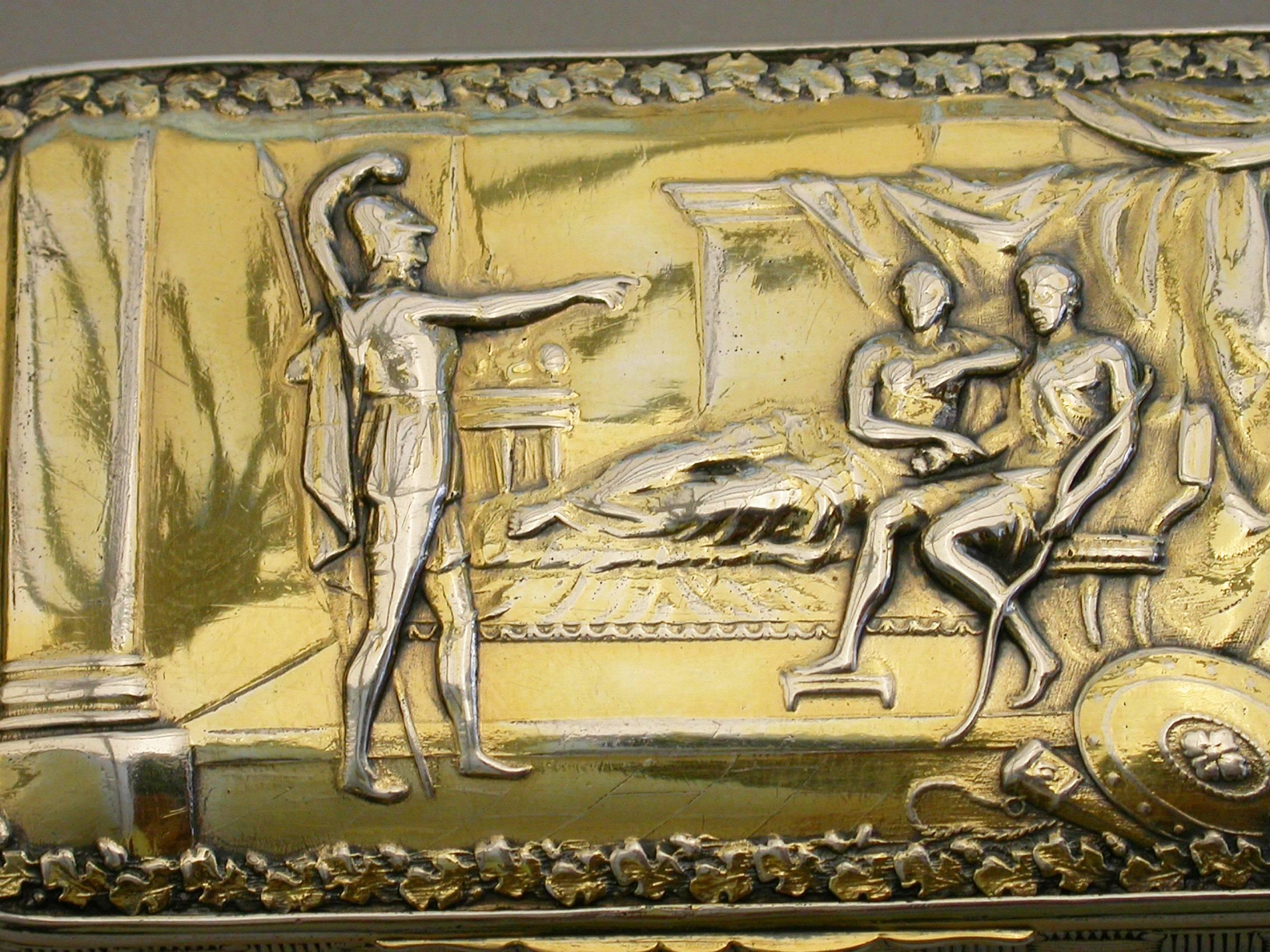 A good George III silver gilt snuff box of rounded rectangular form, the base and sides with basket weave decoration, the hinged lid with raised mythological scene depicting Achilles remonstrating with Agamemnon over Briseis within a formal leaf