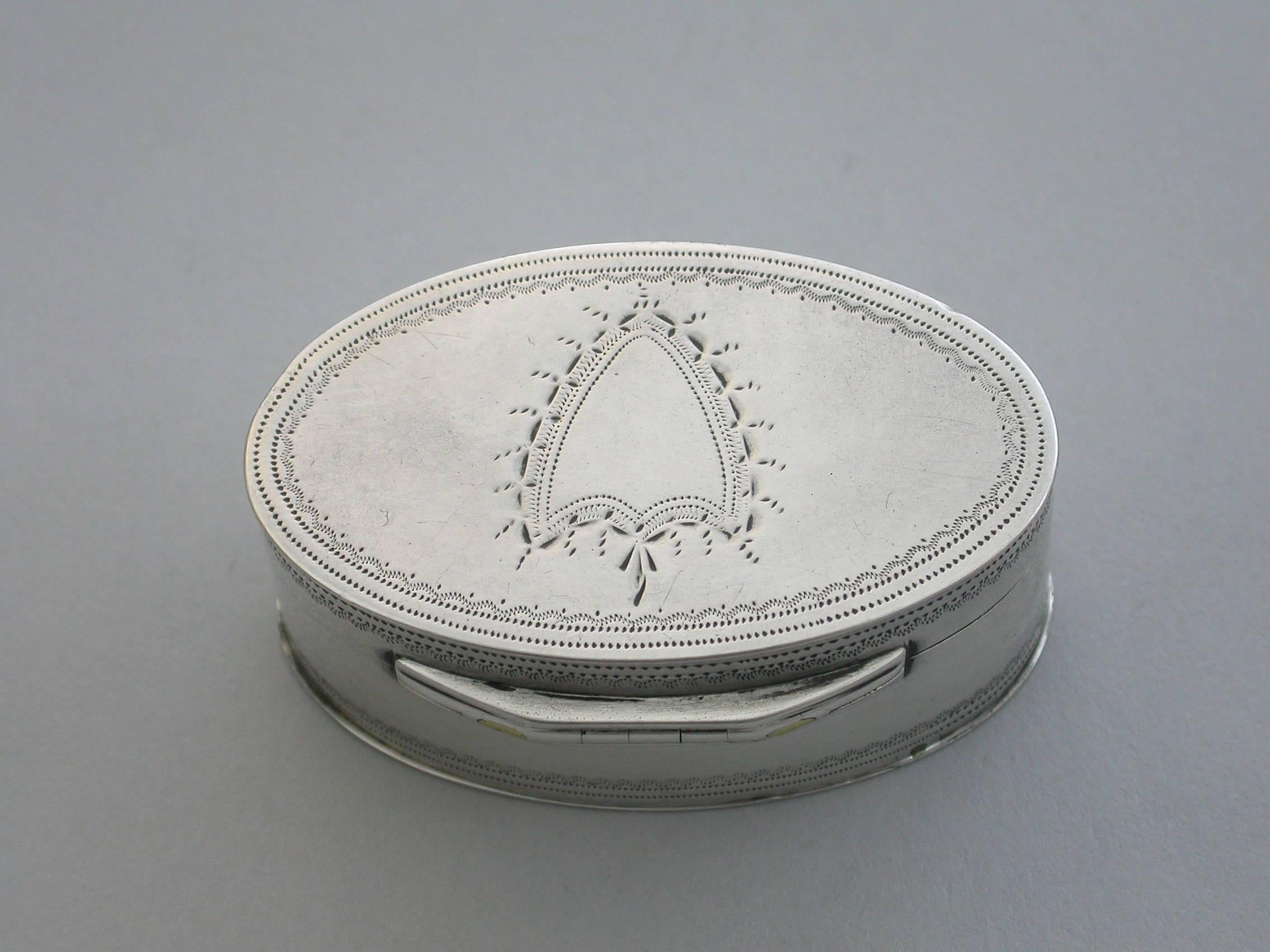 A good quality George III silver Nutmeg Grater of navette shape with bright-cut engraved decoration including vacant cartouches to the lid and base.

Made in Birmingham, 1794 (no markers mark).

In good condition with no damage or