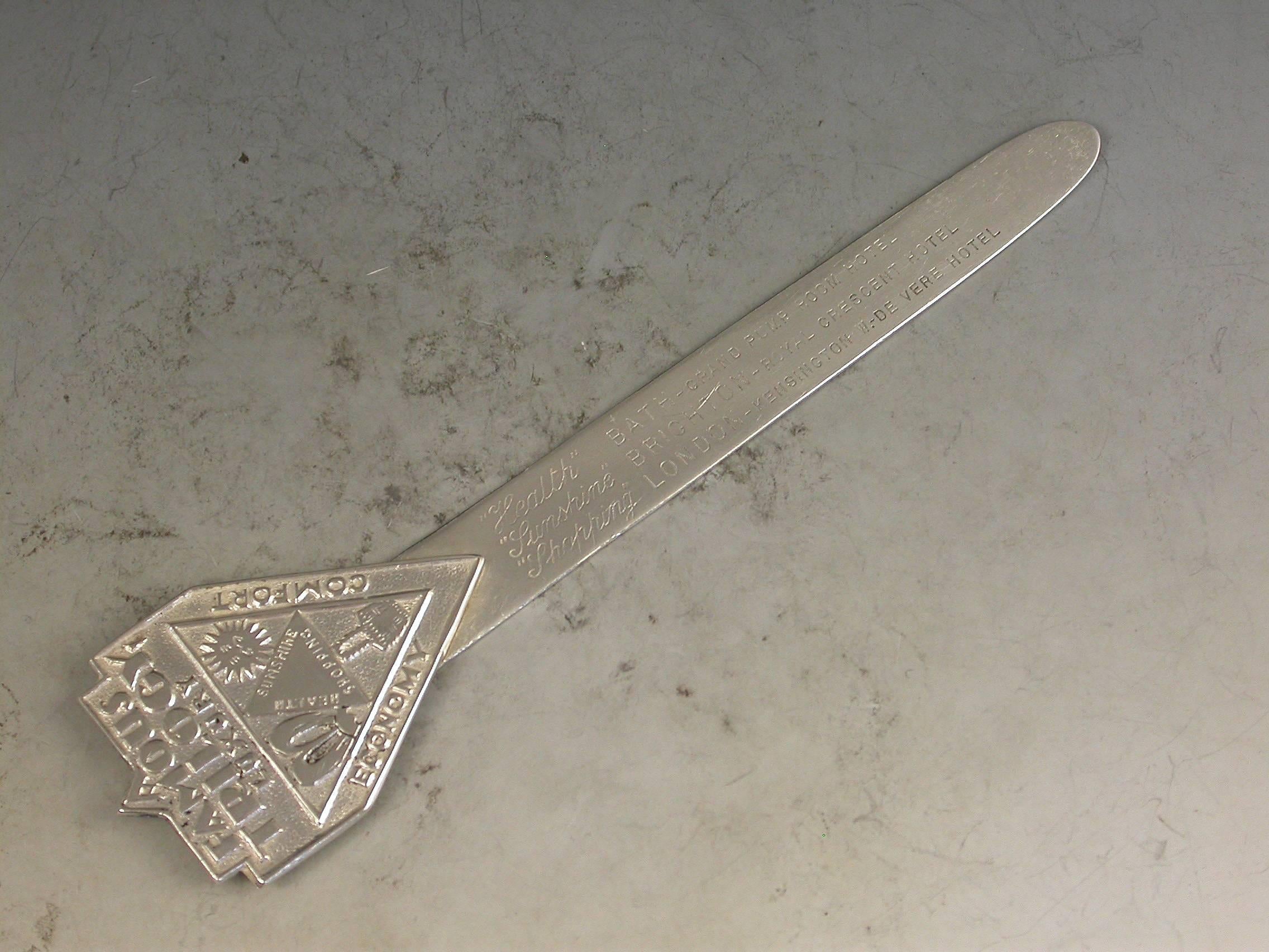 A unusual George V silver bookmark made to advertise three hotels in Bath, Brighton and London, the terminal stamped 