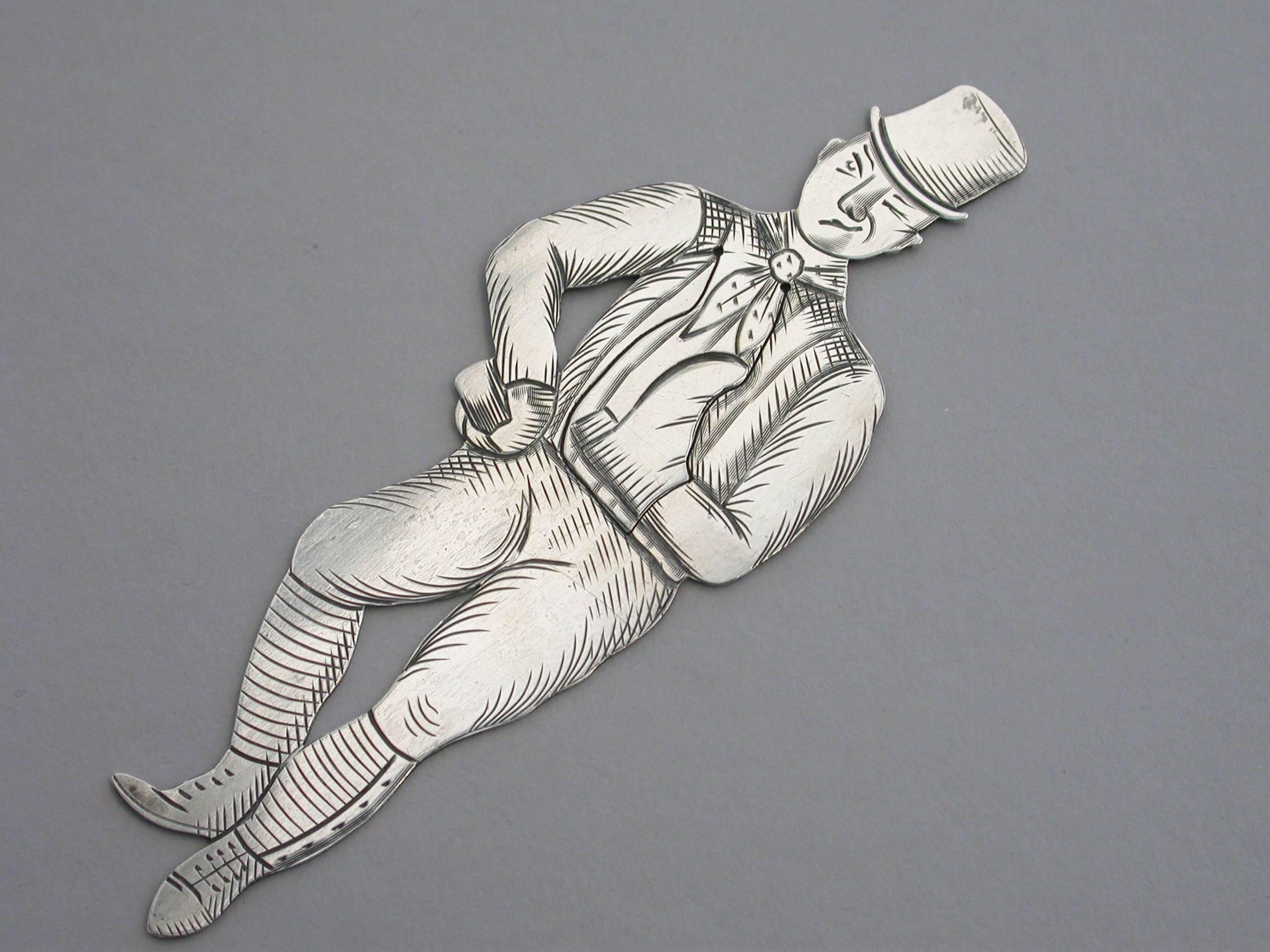 A rare early 20th century American novelty silver figural bookmark, depicting the character Sam Weller from the Charles Dickens novel, The Pickwick Papers.

By J F Fradley, New York, circa 1901-1910

In good condition with no damage or