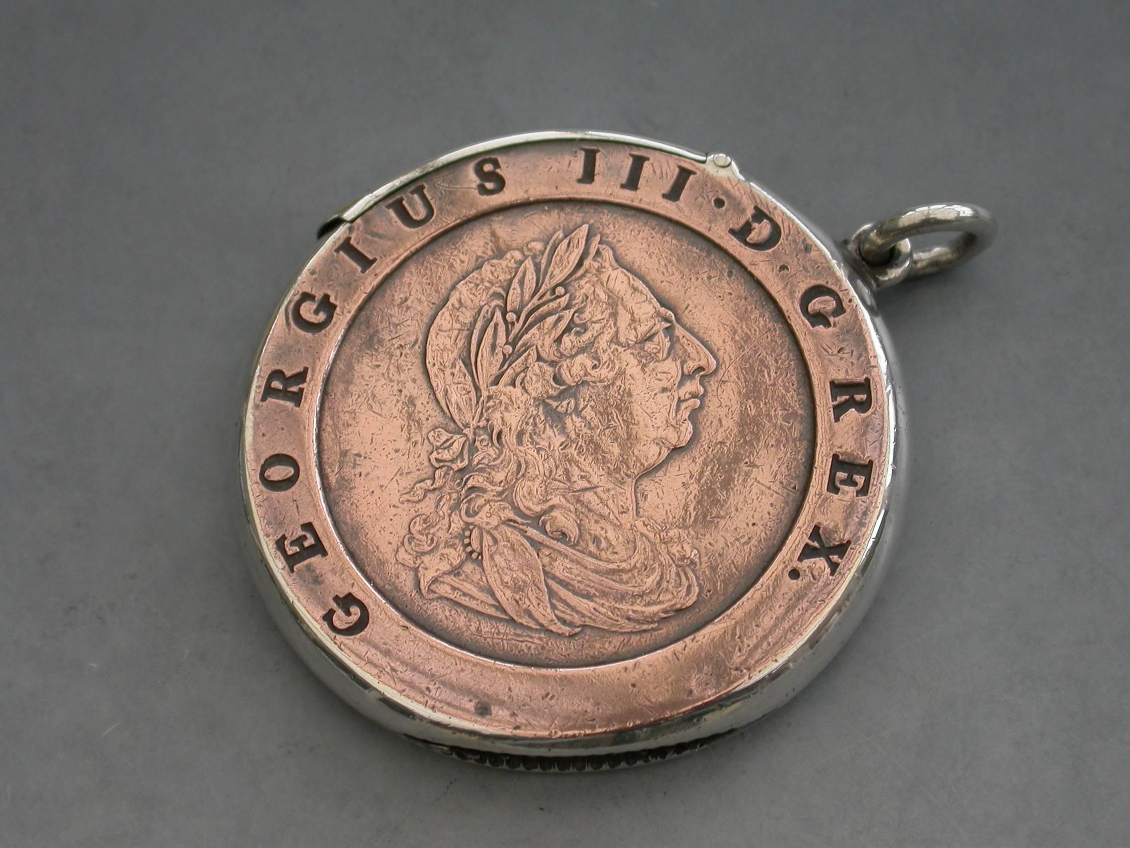 A rare Victorian silver mounted vesta case formed from a large George III copper 