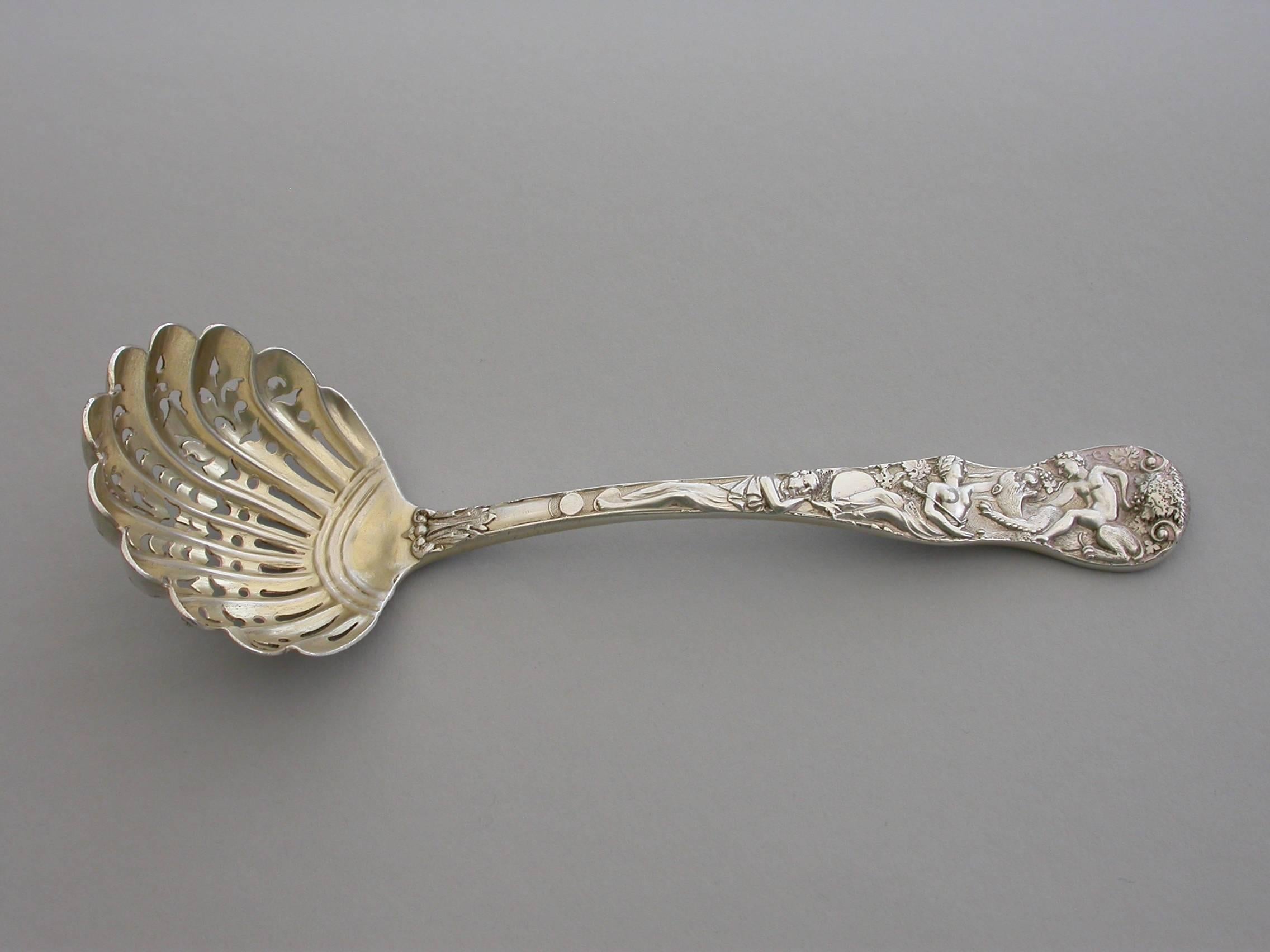 A fine quality Victorian cast silver sugar sifter ladle in 