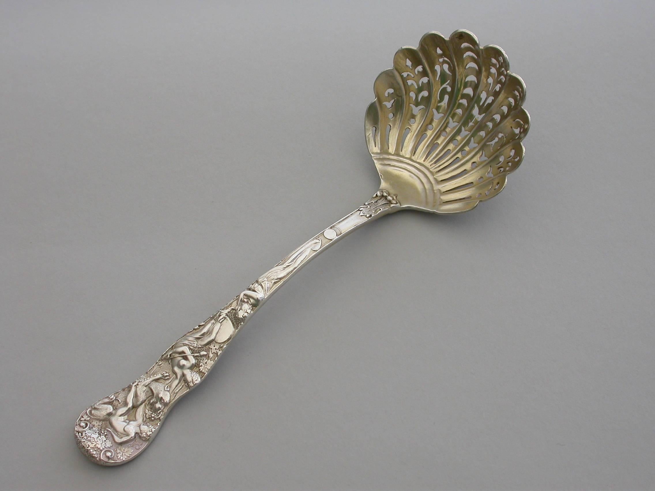 Mid-19th Century Victorian Cast Silver Bacchanalian Pattern Sugar Sifter Ladle, London, 1844