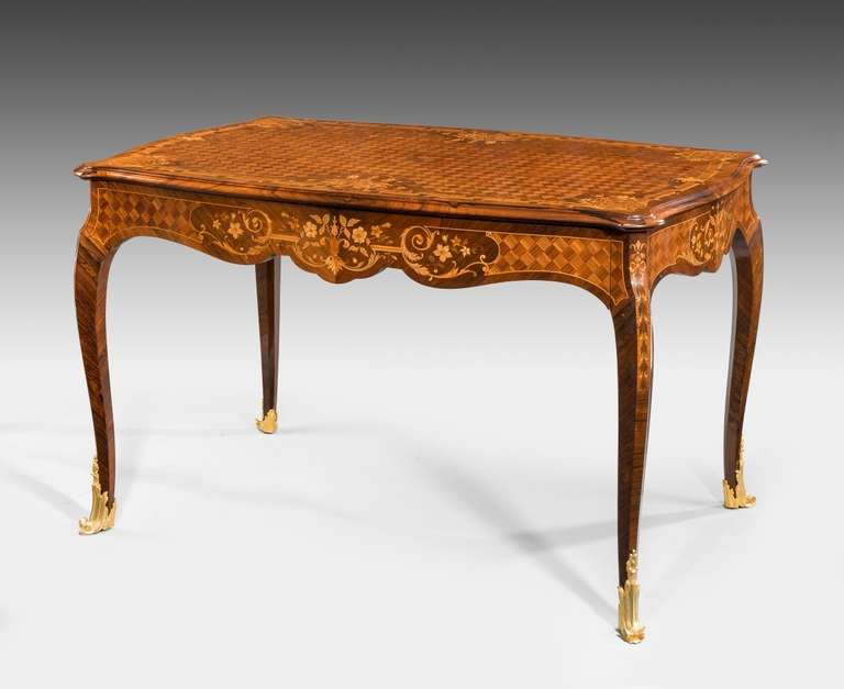 Fine Napoleon III rosewood and marquetry writing table with trellis work with one long freeze drawer.