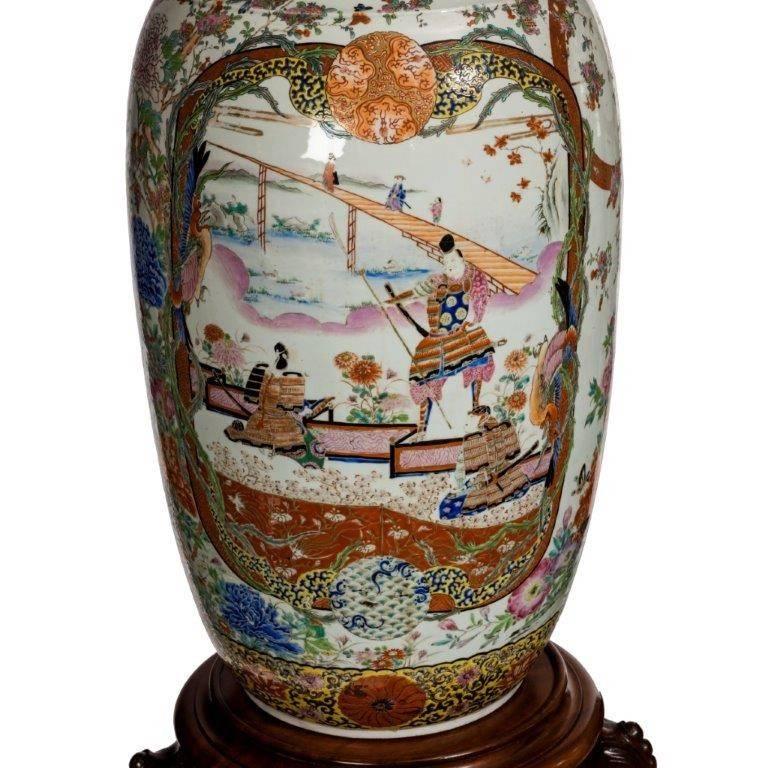 A superb pair of Fukagawa polychrome porcelain vases with panels of samurai and landscapes on a floral ground. On the original mahogany stands. Japanese, circa 1890.
Measures: Height 50 in overall.