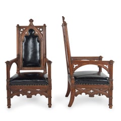 A Fine Pair Of 19th Century French Gothic Oak Open Arm Chairs, Reupholstered
