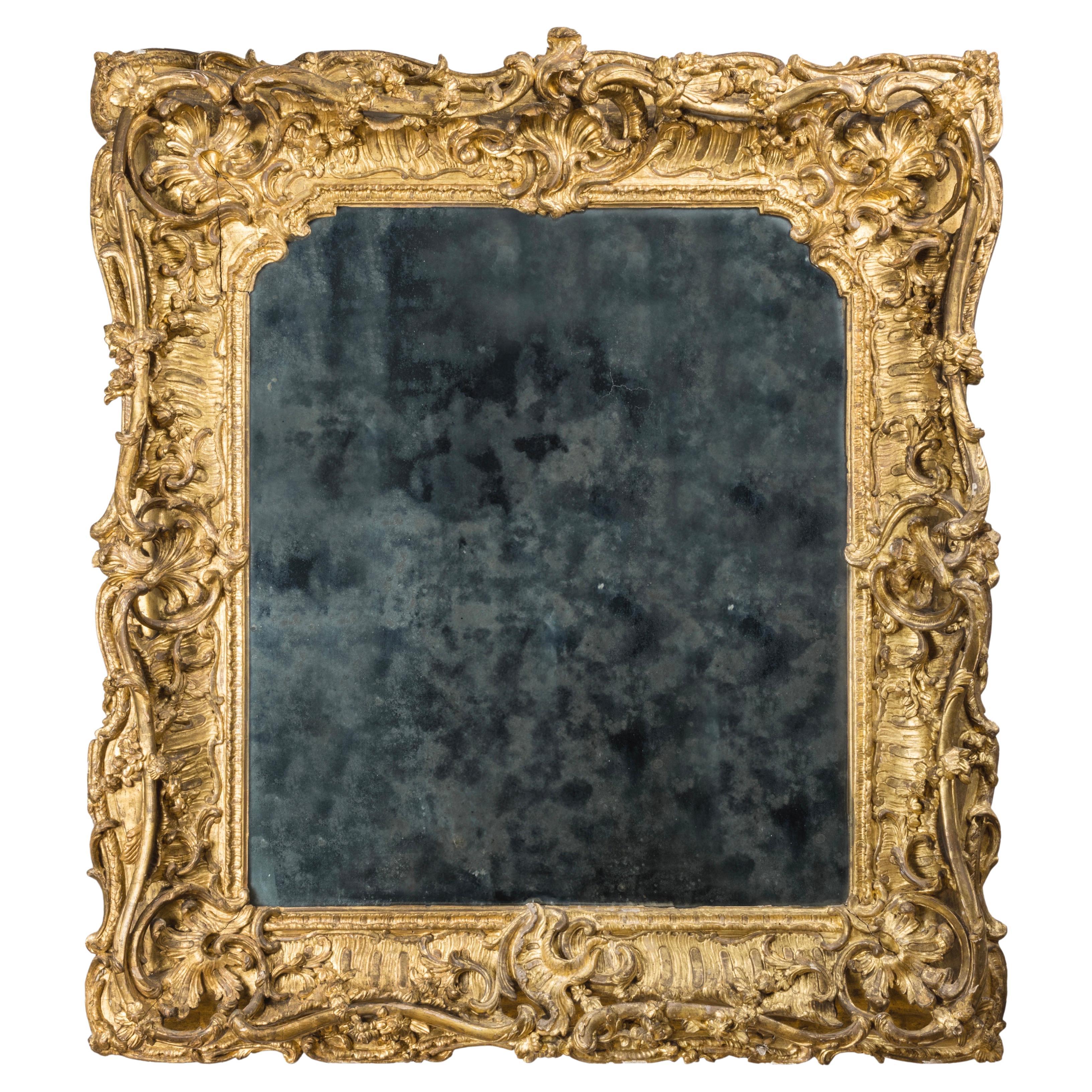 French Asymmetric 18th c. Rococo Frame, carved and gilded wood, circa 1735-40 For Sale