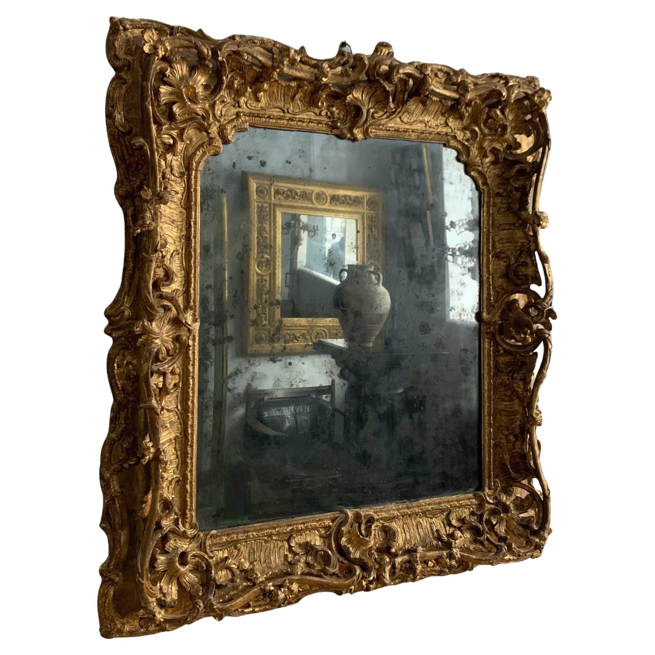 French Asymmetric 18th c. Rococo Frame, carved and gilded wood, circa 1735-40 For Sale