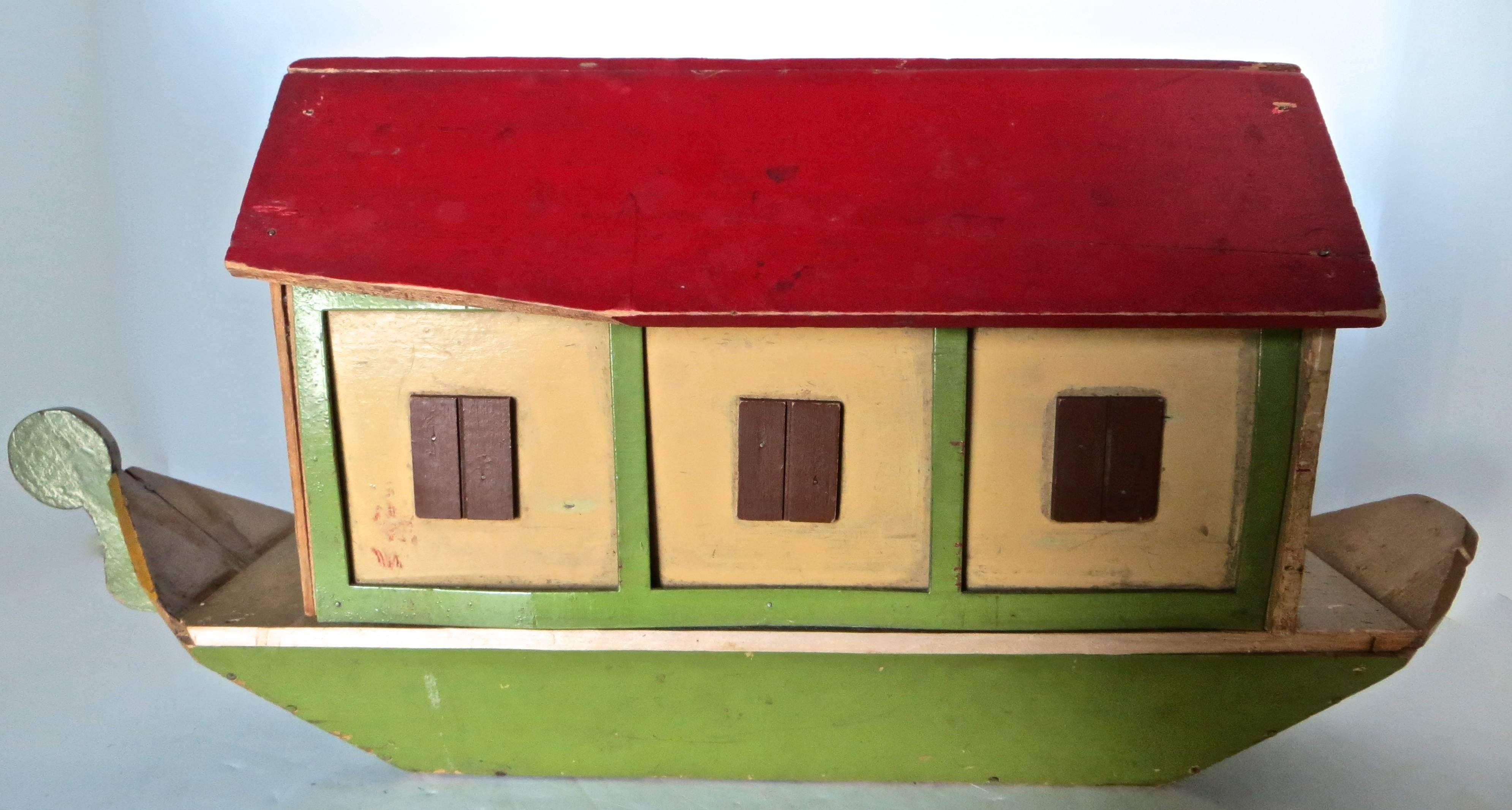 Toy Noah’s Arks for children to play with were very popular in the late 19th and early 20th century, and Germany was very prolific in their production. This particular ark is all original and has the entry/exit ramp platform along with 30 figures,