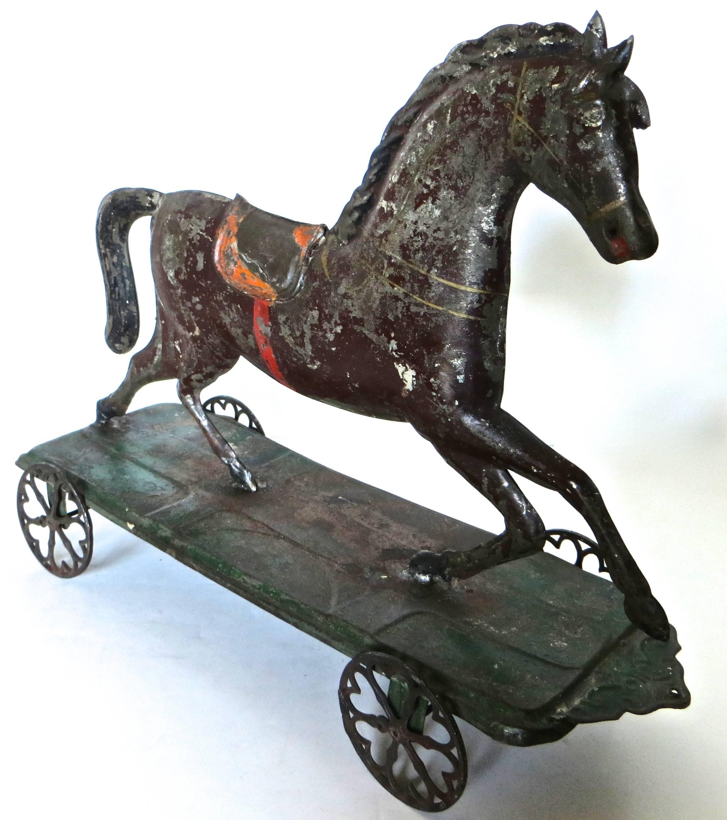 Folk Art American Tin Platform Horse Toy Attributed to Althof, Bergmann & Co., circa 1874