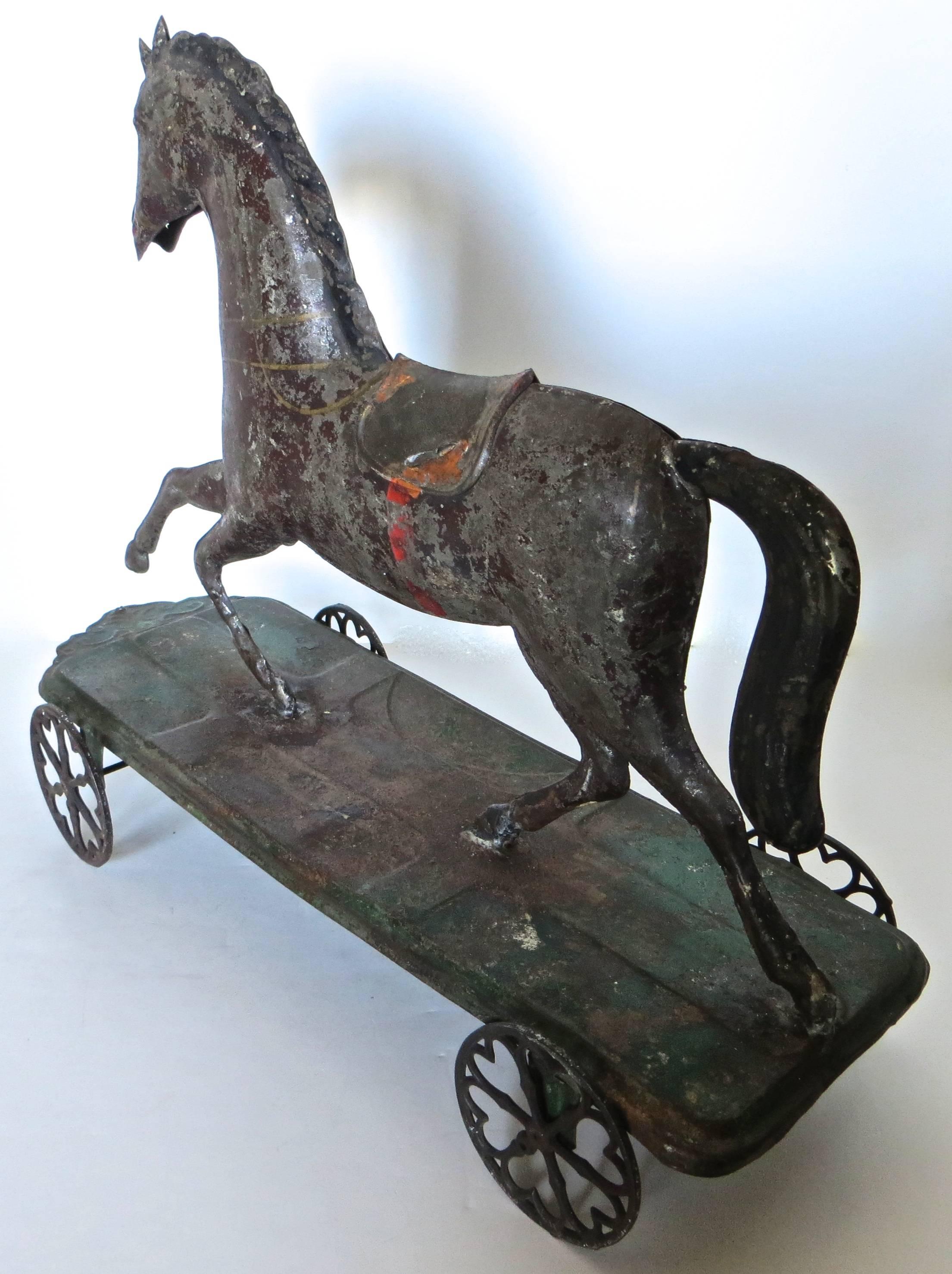 Hand-Painted American Tin Platform Horse Toy Attributed to Althof, Bergmann & Co., circa 1874