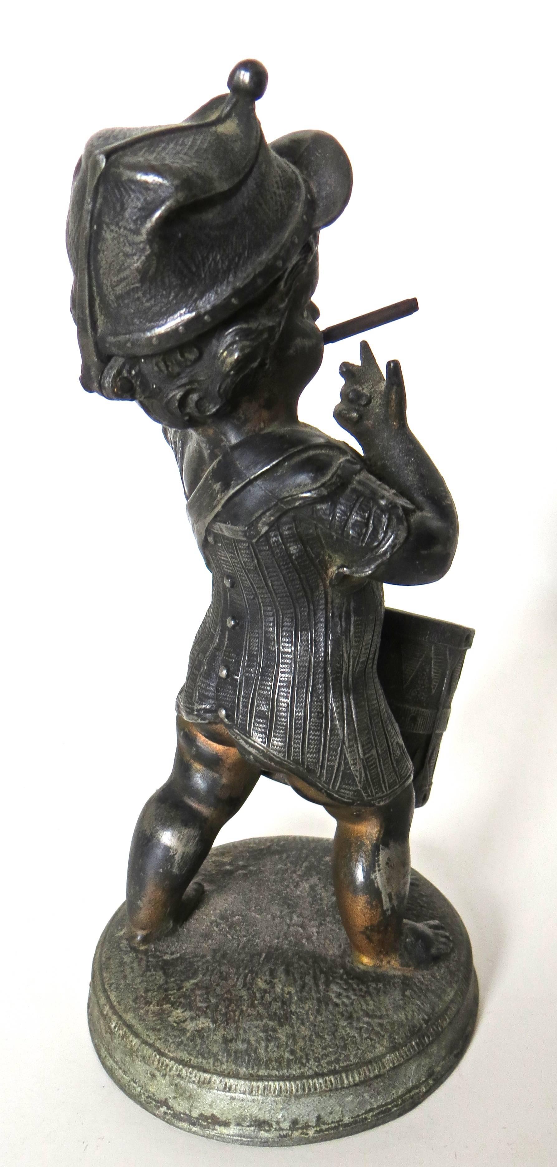 This combination cigar lighter/match holder would have been found in American saloons on top of a bar counter in the late 19th century. It is made out of spelter and is likely of American manufacture, circa 1880s. Kerosene  would have been poured