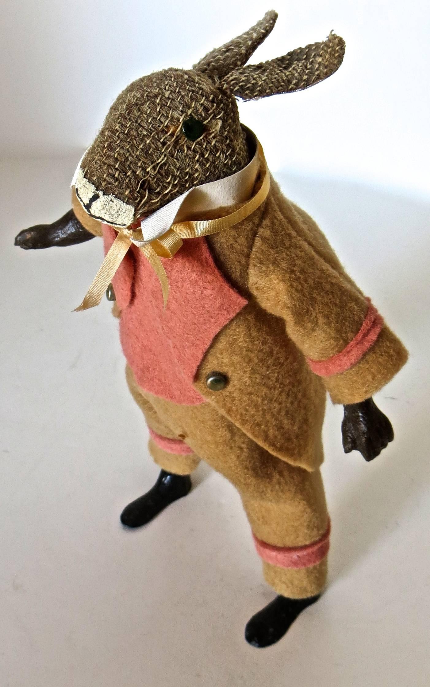 This rare walking rabbit clockwork toy was manufactured in circa 1890 and is probably of French manufacture, due to the lead feet, which was typical of French toy makers in that period.

It operates by winding up the attached clockwork key mounted