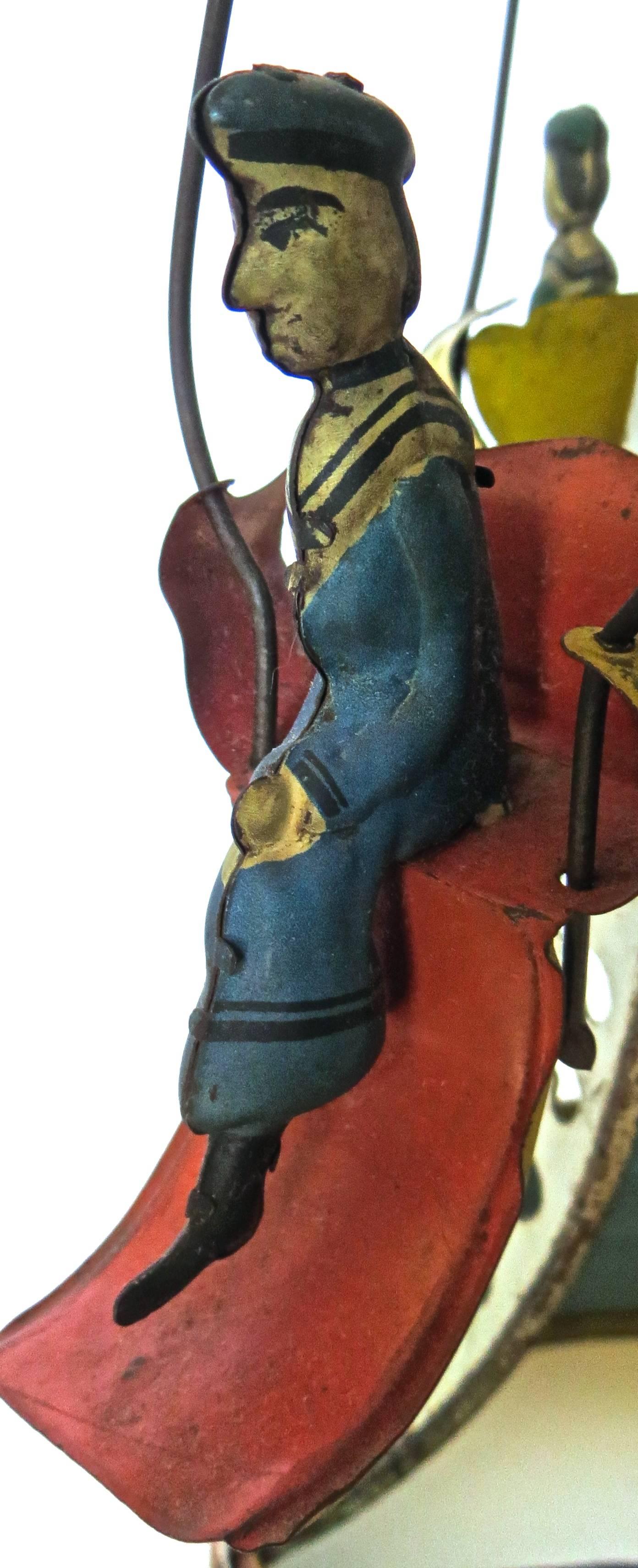 Hand-Painted American Tin Toy, Clockwork Carousel, circa 1895