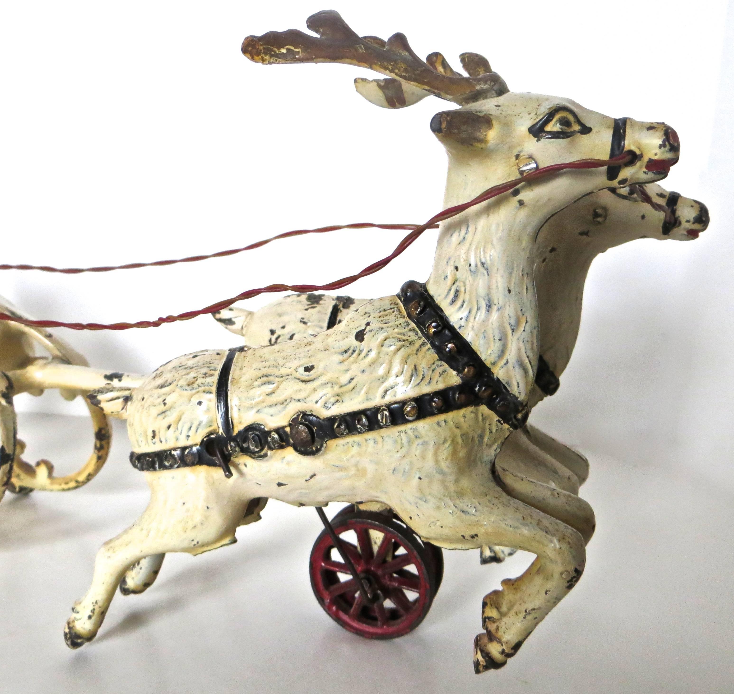 antique cast iron santa sleigh and reindeer