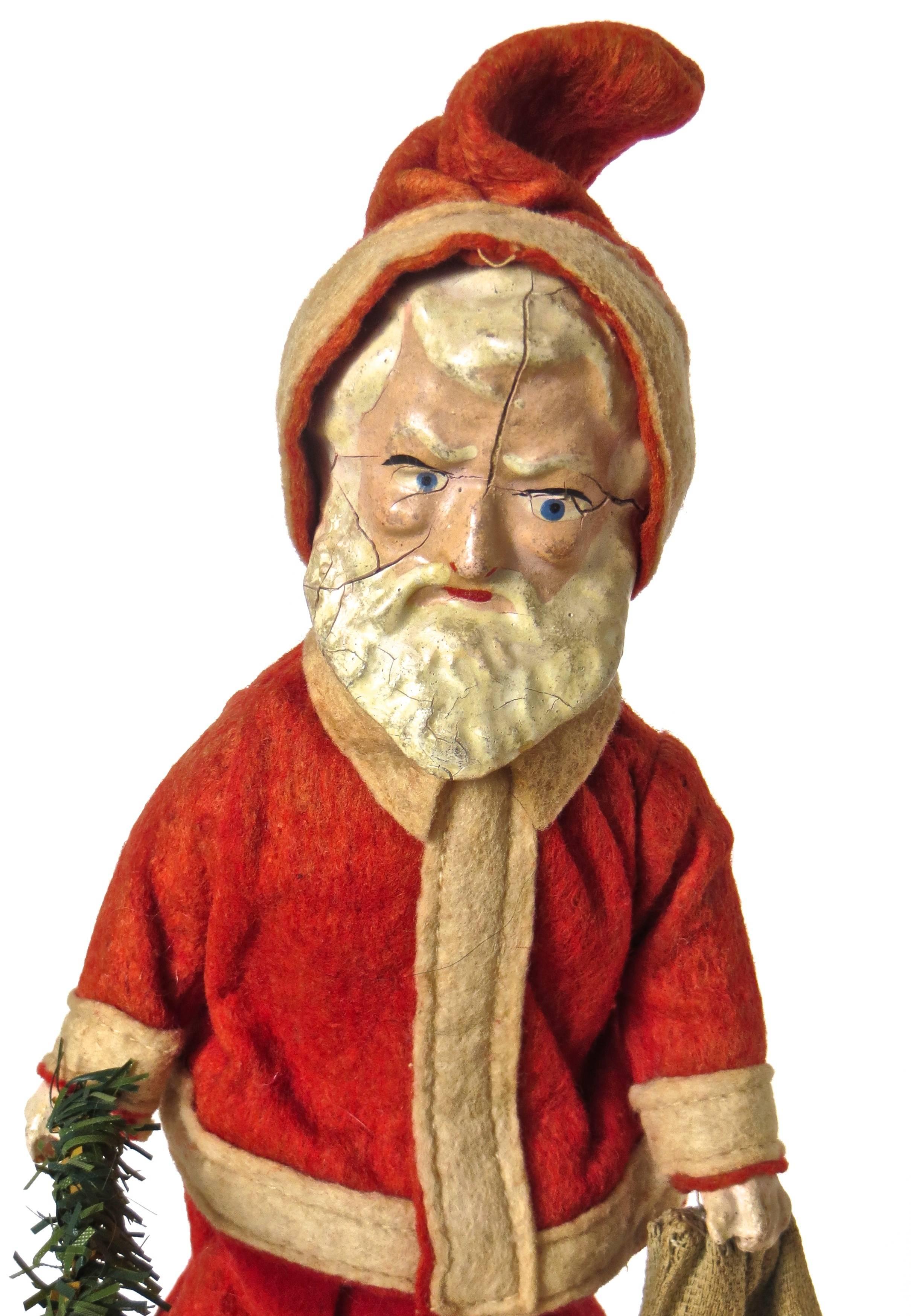 This rare and all original walking Santa Claus clockwork toy was manufactured in about 1890 and is probably of French manufacture, due to the lead feet and hand painted composition head, which was typical of French toy makers in that period.

It