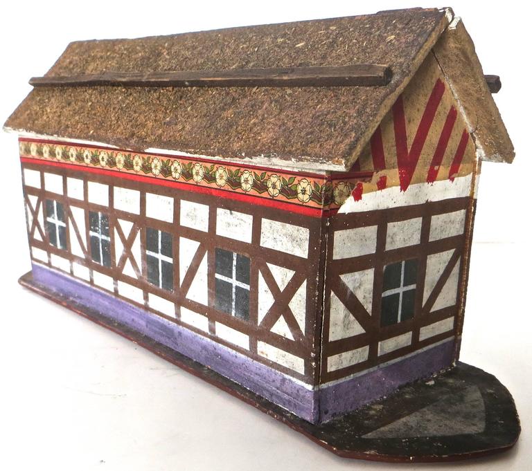 Offered for sale is a very traditional Folk Art item; a handcrafted Noah's Ark toy with 37 hand-painted and hand-carved animals. The flat bottom ark indicates that it was probably made in the Erzgebirge region of Germany Circa 1890, which was known