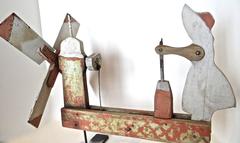 Kreisel mit Darstellung einer Frau beim Buttern, amerikanisch, um 1940