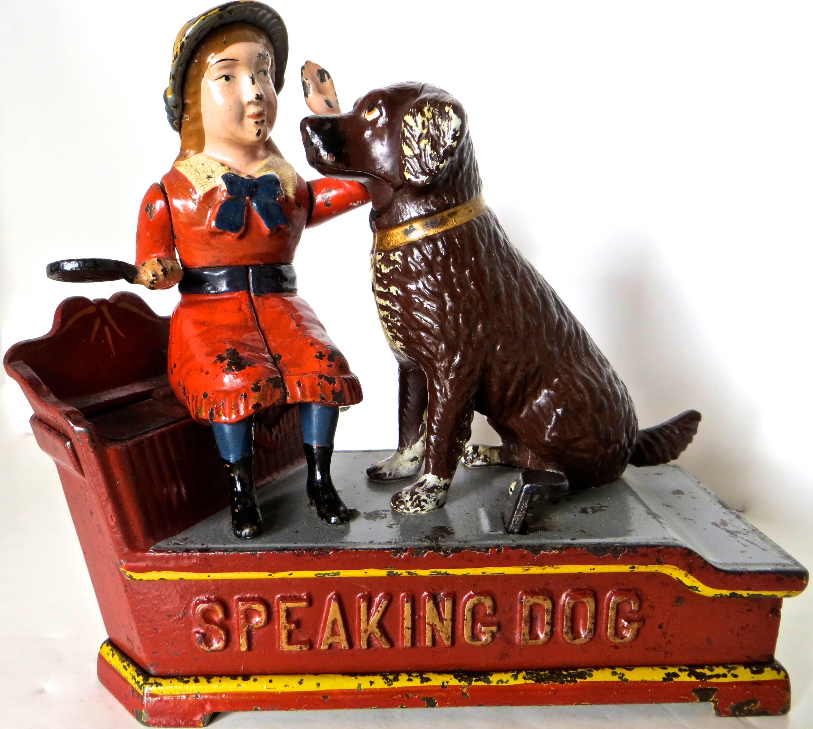 This particular example is one of the top condition "Speaking Dog" mechanical banks known to exist. Manufactured in 1885 by the Shepard Hardware Company in Buffalo, New York, this cast iron mechanical bank measures 7 1/8" long and is