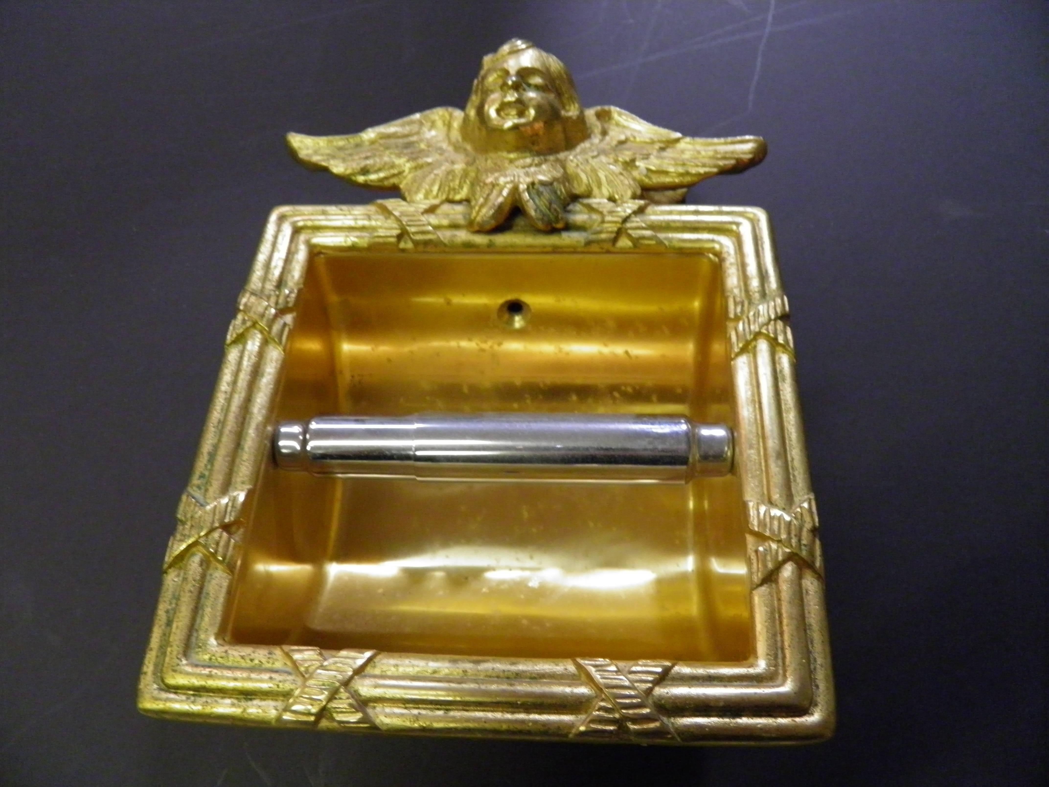 Luxurious rare made in a very small quantity in the 1970s Sherle Wagner bathroom angel top toilet tissue holder 22-carat gold finish-ribbon and reed Angel design recessed in the wall toilet tissue holder made to be recessed in the wall .No longer