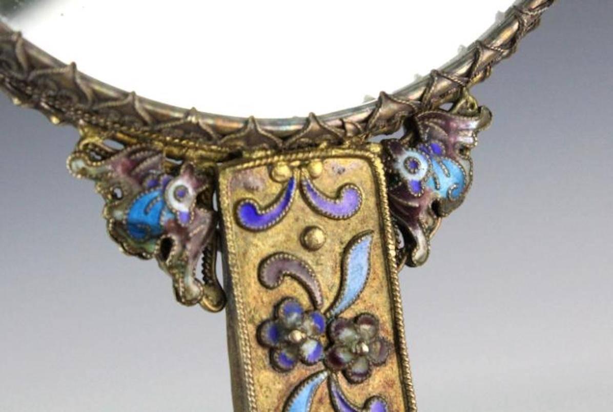 A most auspicious gift for a VIP in your life, comes with many kisses,
19th century or earlier- Qing Dynasty.
Very finely crafted of fine silver gilt filigree with venerable designs enameled blue and purple decoration. Small bats and flowers enhance