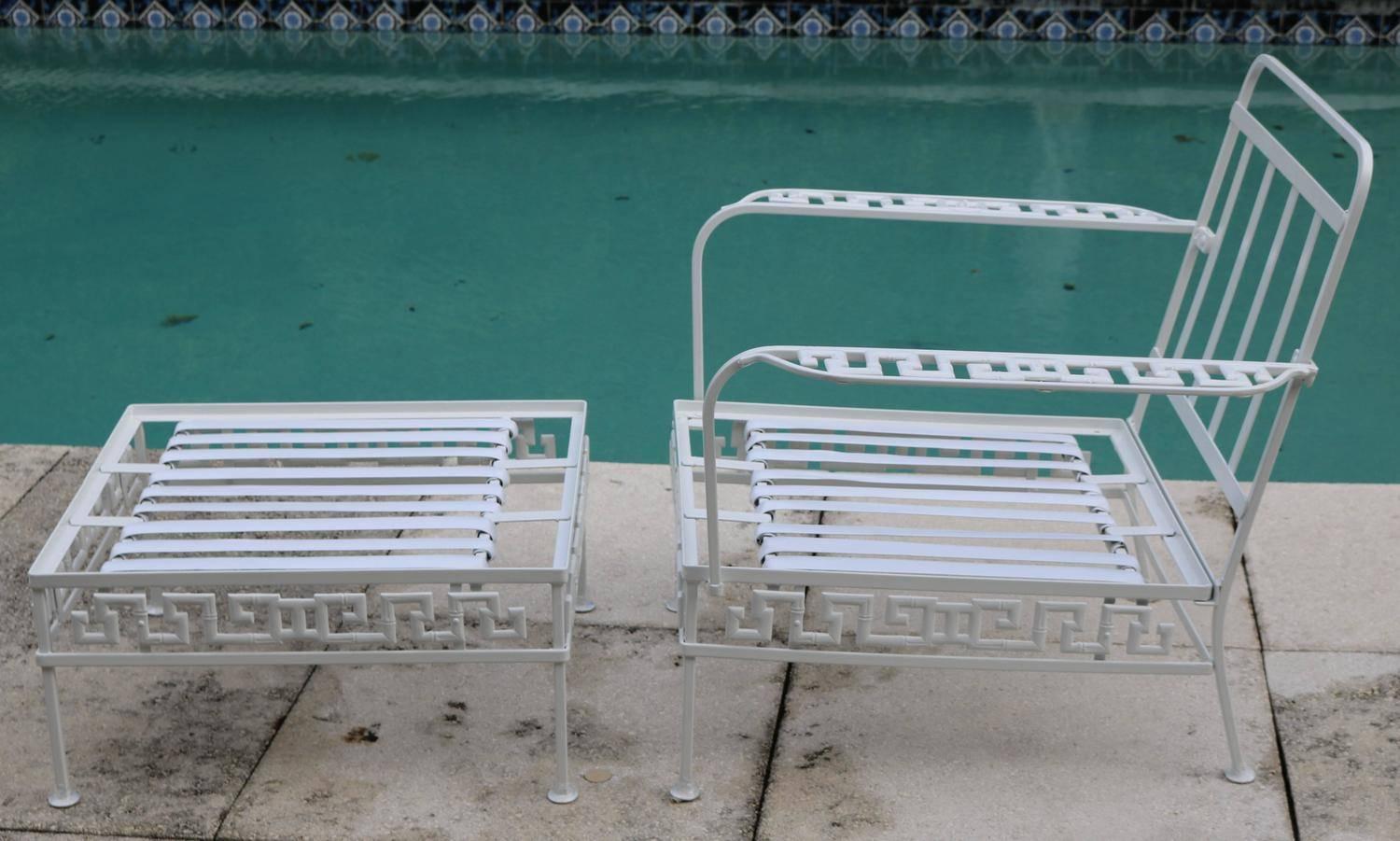Mid-Century Modern Hollywood Regency Salterini aluminum in classical Greek key design lounge chair and ottoman.
Deep comfy seat and back cushions in light green poly suede-in restored condition. The frame is newly powder-coated white and the frame